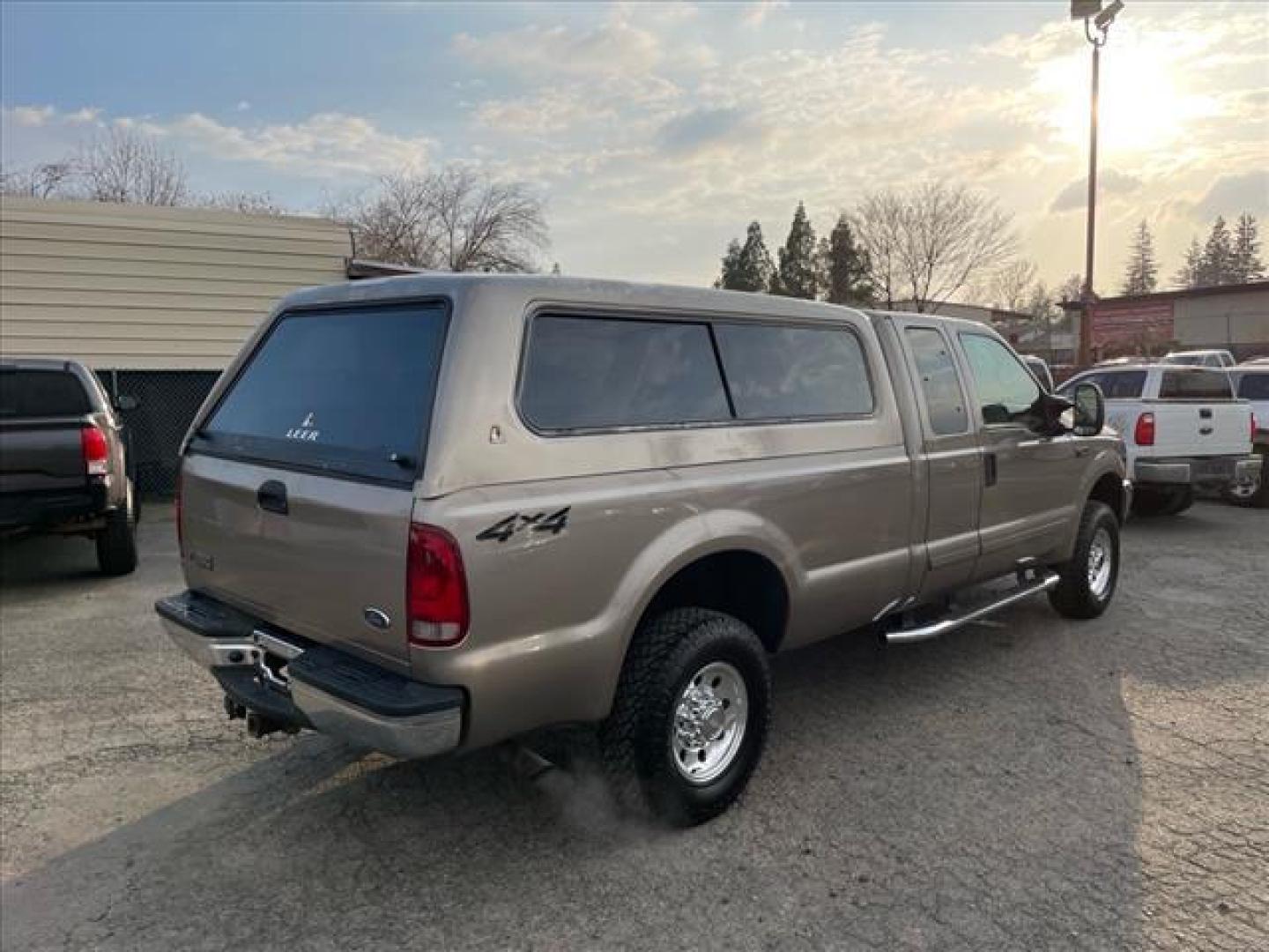 2002 Arizona Beige Clearcoat Metallic Ford F-250 Super Duty XLT (1FTNX21S82E) with an Triton 6.8L V10 310hp 425ft. lbs. Other engine, 4-Speed Automatic transmission, located at 800 Riverside Ave, Roseville, CA, 95678, 916-773-4549 & Toll Free: 866-719-4393, 38.732265, -121.291039 - 4X4 SUPER CAB XLT 88K MILES NEW TIRES ONE OWNER CLEAN CARFAX - Photo#3