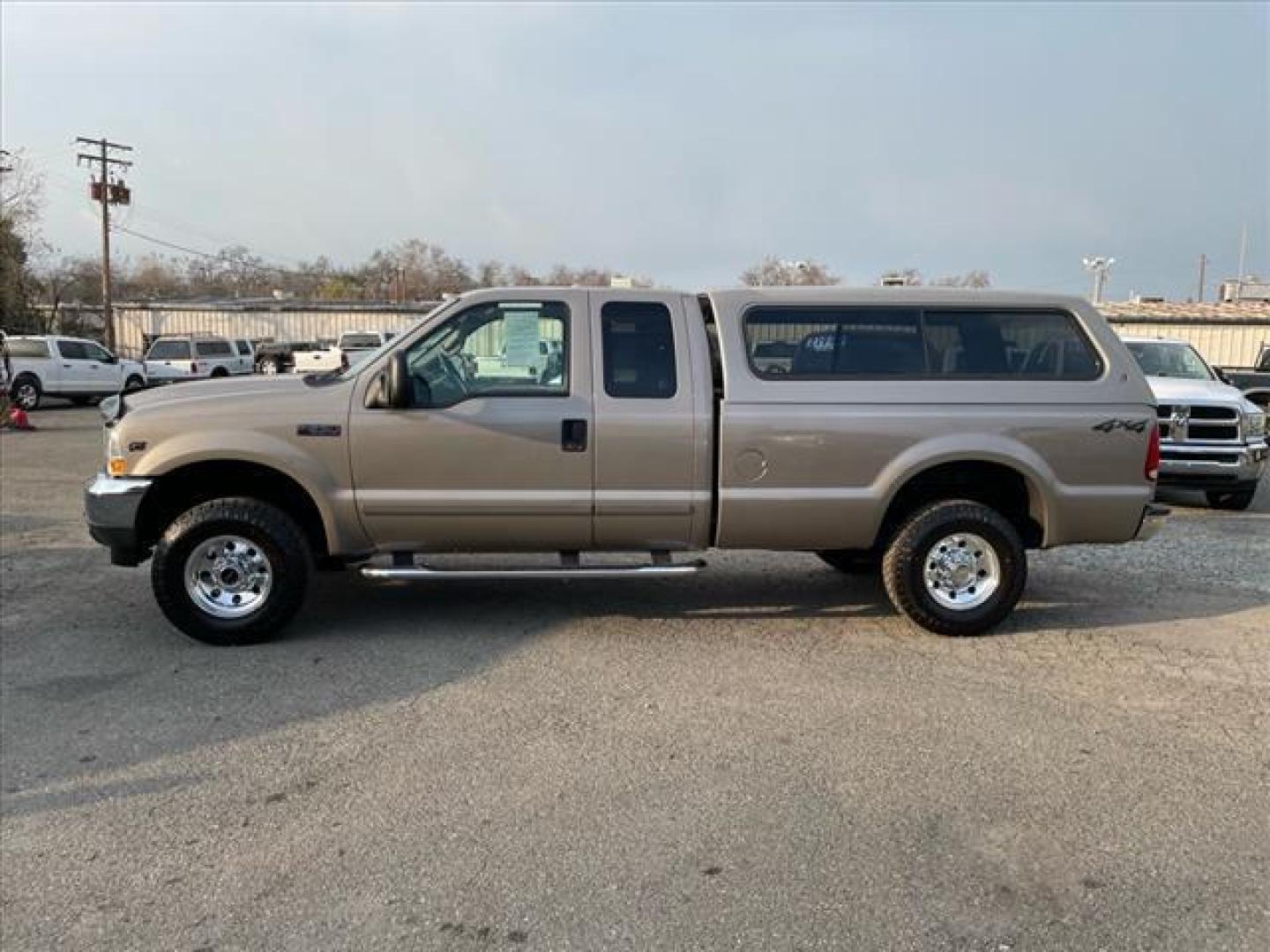 2002 Arizona Beige Clearcoat Metallic Ford F-250 Super Duty XLT (1FTNX21S82E) with an Triton 6.8L V10 310hp 425ft. lbs. Other engine, 4-Speed Automatic transmission, located at 800 Riverside Ave, Roseville, CA, 95678, 916-773-4549 & Toll Free: 866-719-4393, 38.732265, -121.291039 - 4X4 SUPER CAB XLT 88K MILES NEW TIRES ONE OWNER CLEAN CARFAX - Photo#4