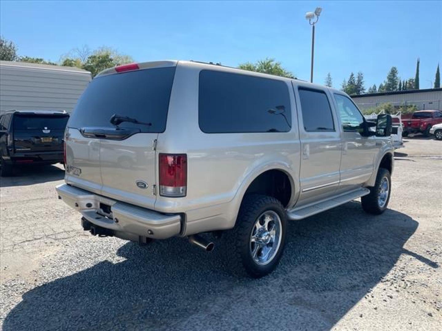 2005 Pueblo Gold Clearcoat Metallic Ford Excursion Limited (1FMSU43P35E) with an 6.0L Power Stroke 6.0L Diesel Turbo V8 325hp 560ft. lbs. Common Rail Direct Injection engine, 5-Speed Automatic transmission, located at 800 Riverside Ave, Roseville, CA, 95678, 916-773-4549 & Toll Free: 866-719-4393, 38.732265, -121.291039 - DIESEL 4X4 LIMITED DVD CLEAN CARFAX - Photo#4