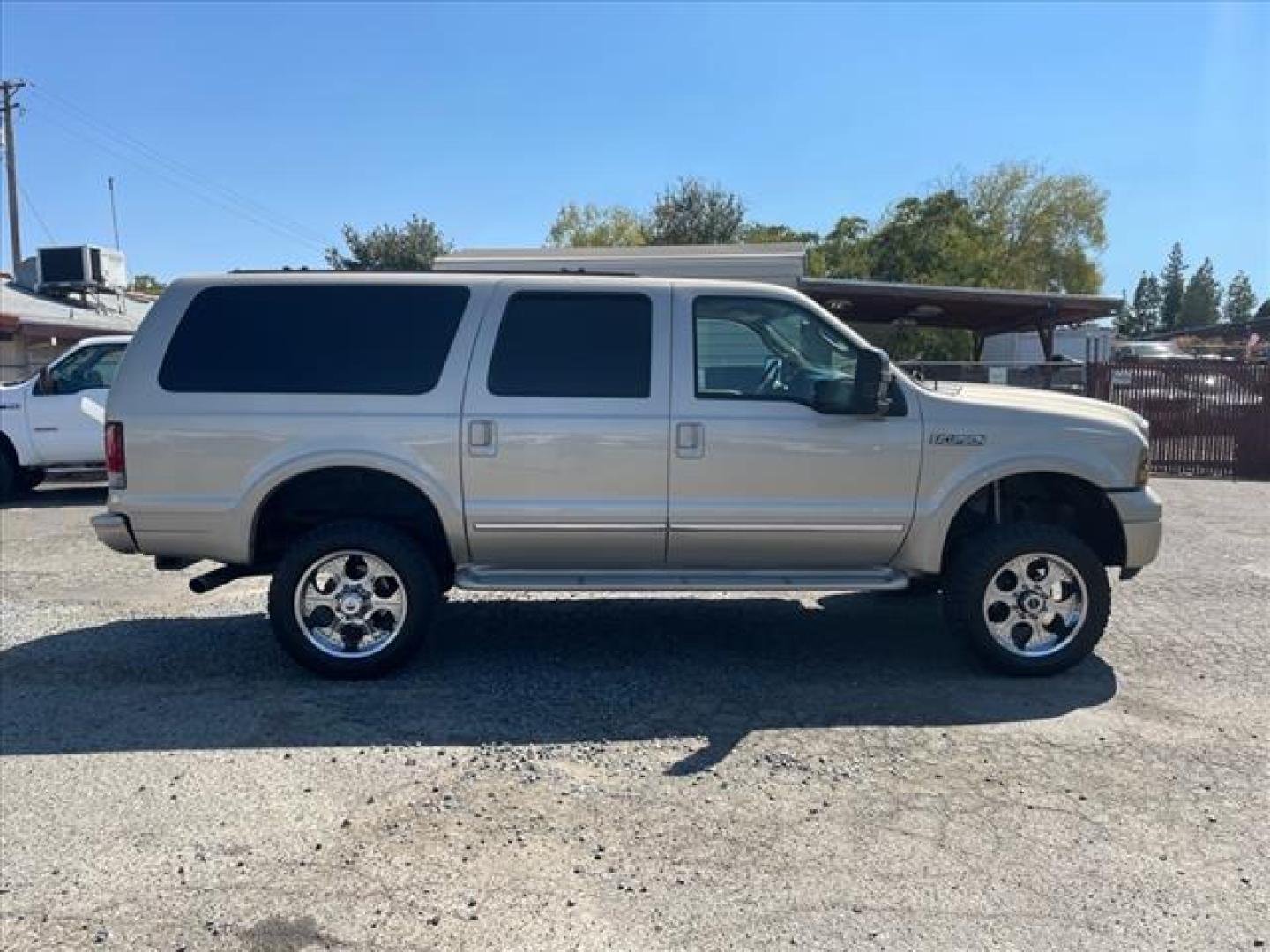 2005 Pueblo Gold Clearcoat Metallic Ford Excursion Limited (1FMSU43P35E) with an 6.0L Power Stroke 6.0L Diesel Turbo V8 325hp 560ft. lbs. Common Rail Direct Injection engine, 5-Speed Automatic transmission, located at 800 Riverside Ave, Roseville, CA, 95678, 916-773-4549 & Toll Free: 866-719-4393, 38.732265, -121.291039 - DIESEL 4X4 LIMITED DVD CLEAN CARFAX - Photo#5