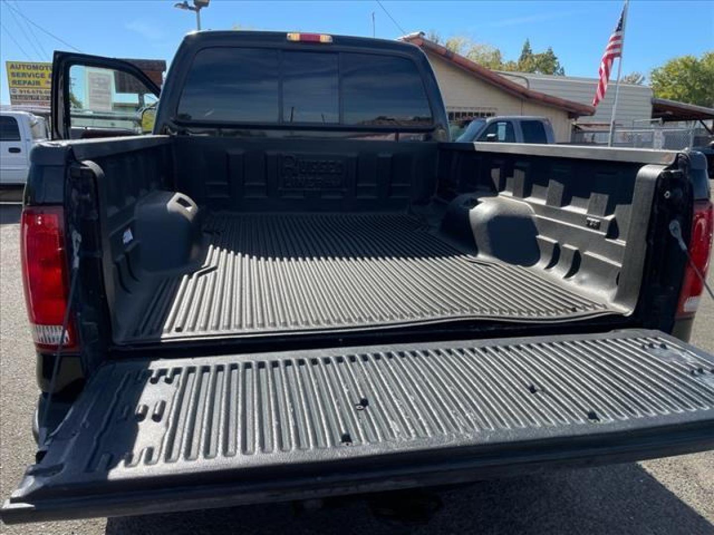 2006 Black Clearcoat Ford F-250 Super Duty Lariat (1FTSW21P46E) with an 6.0L Power Stroke 6.0L Diesel Turbo V8 325hp 560ft. lbs. Direct Injection engine, 5-Speed Automatic transmission, located at 800 Riverside Ave, Roseville, CA, 95678, 916-773-4549 & Toll Free: 866-719-4393, 38.732265, -121.291039 - DIESEL CREW CAB 4X4 LARIAT LIFTED CLEAN CARFAX - Photo#11