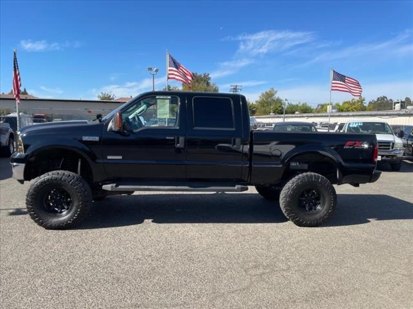 2006 Black Clearcoat Ford F-250 Super Duty Lariat (1FTSW21P46E) with an 6.0L Power Stroke 6.0L Diesel Turbo V8 325hp 560ft. lbs. Direct Injection engine, 5-Speed Automatic transmission, located at 800 Riverside Ave, Roseville, CA, 95678, 916-773-4549 & Toll Free: 866-719-4393, 38.732265, -121.291039 - DIESEL CREW CAB 4X4 LARIAT LIFTED CLEAN CARFAX - Photo#1