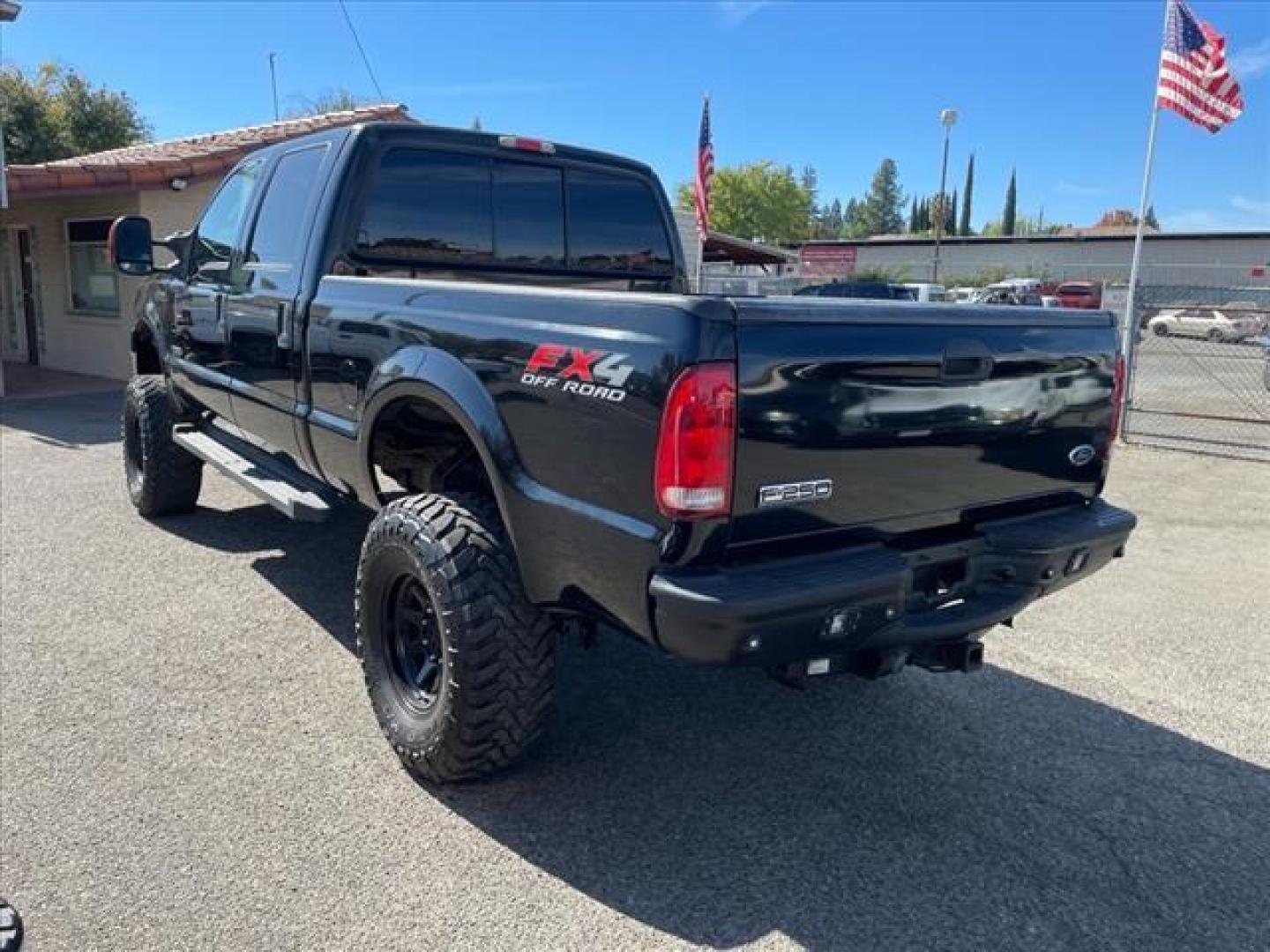 2006 Black Clearcoat Ford F-250 Super Duty Lariat (1FTSW21P46E) with an 6.0L Power Stroke 6.0L Diesel Turbo V8 325hp 560ft. lbs. Direct Injection engine, 5-Speed Automatic transmission, located at 800 Riverside Ave, Roseville, CA, 95678, 916-773-4549 & Toll Free: 866-719-4393, 38.732265, -121.291039 - DIESEL CREW CAB 4X4 LARIAT LIFTED CLEAN CARFAX - Photo#2