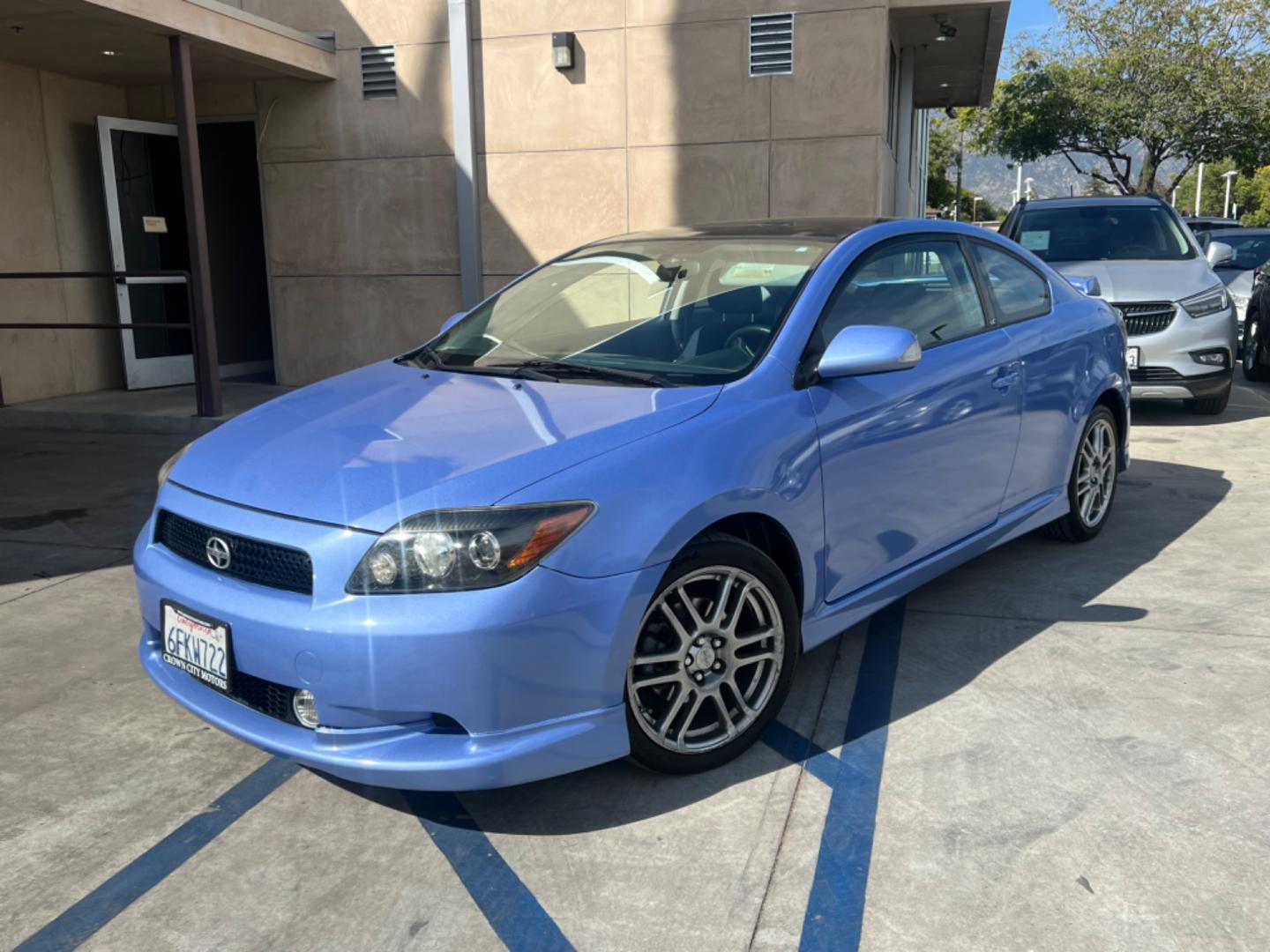 2009 BLUE /Gray Scion tC Sport Coupe (JTKDE167790) with an 2.4L L4 DOHC 16V engine, Automatic transmission, located at 30 S. Berkeley Avenue, Pasadena, CA, 91107, (626) 248-7567, 34.145447, -118.109398 - Navigation! New Tires! New Paint! Pasadena, CA is a city of dreams, culture, and innovation. Whether you're cruising down its historic boulevards or navigating the bustling streets of neighboring Altadena and Glendale, having a reliable car is paramount. Enter the 2009 Scion TC—a vehicle that e - Photo#0