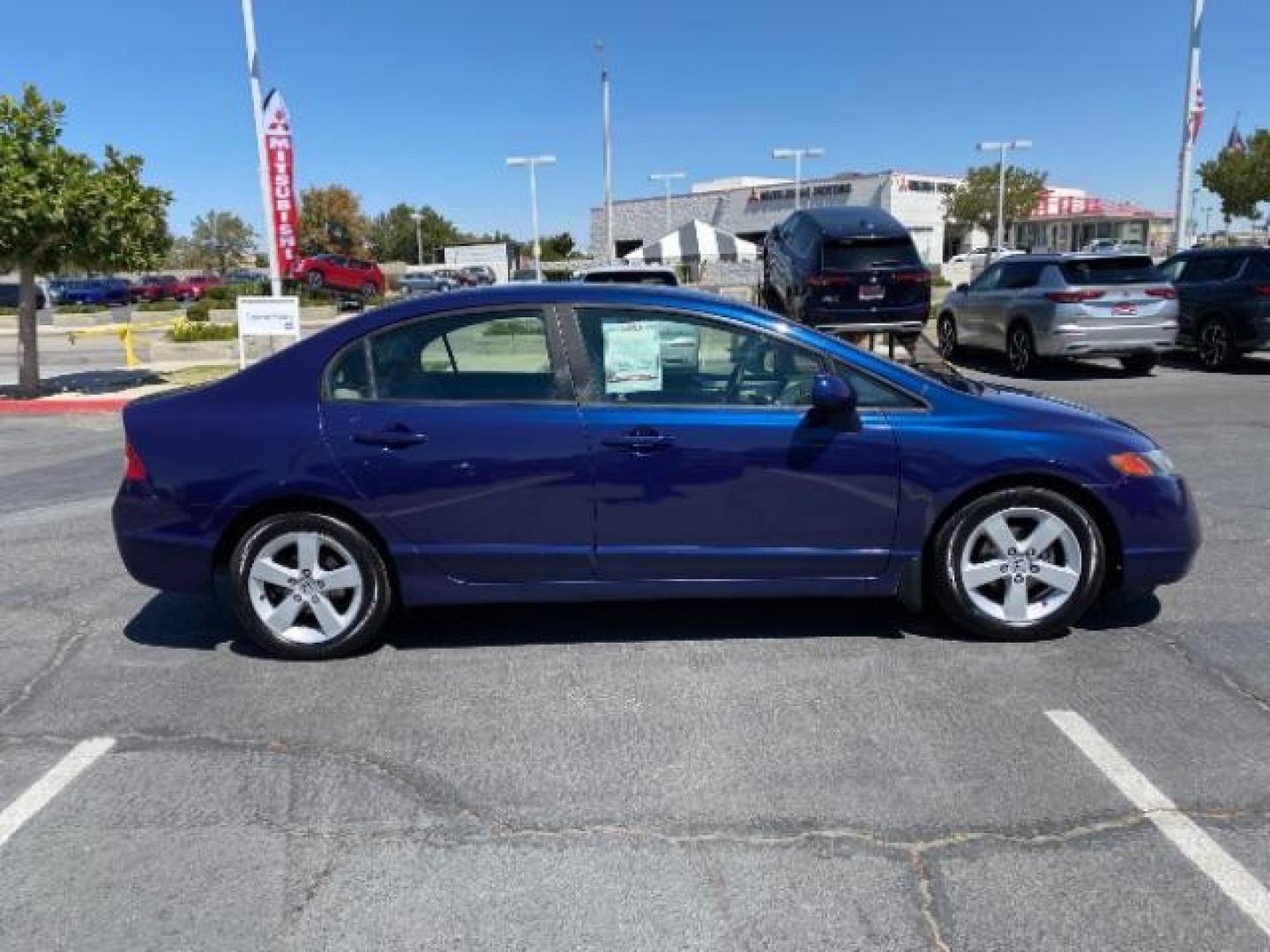 2009 SILVER Honda Civic Sedan (19XFA16589E) with an 4-Cyl VTEC 1.8 Liter engine, Automatic 5-Spd w/Overdrive transmission, located at 412 Auto Vista Drive, Palmdale, 93551, (661) 945-0620, 34.592636, -118.136681 - Photo#8