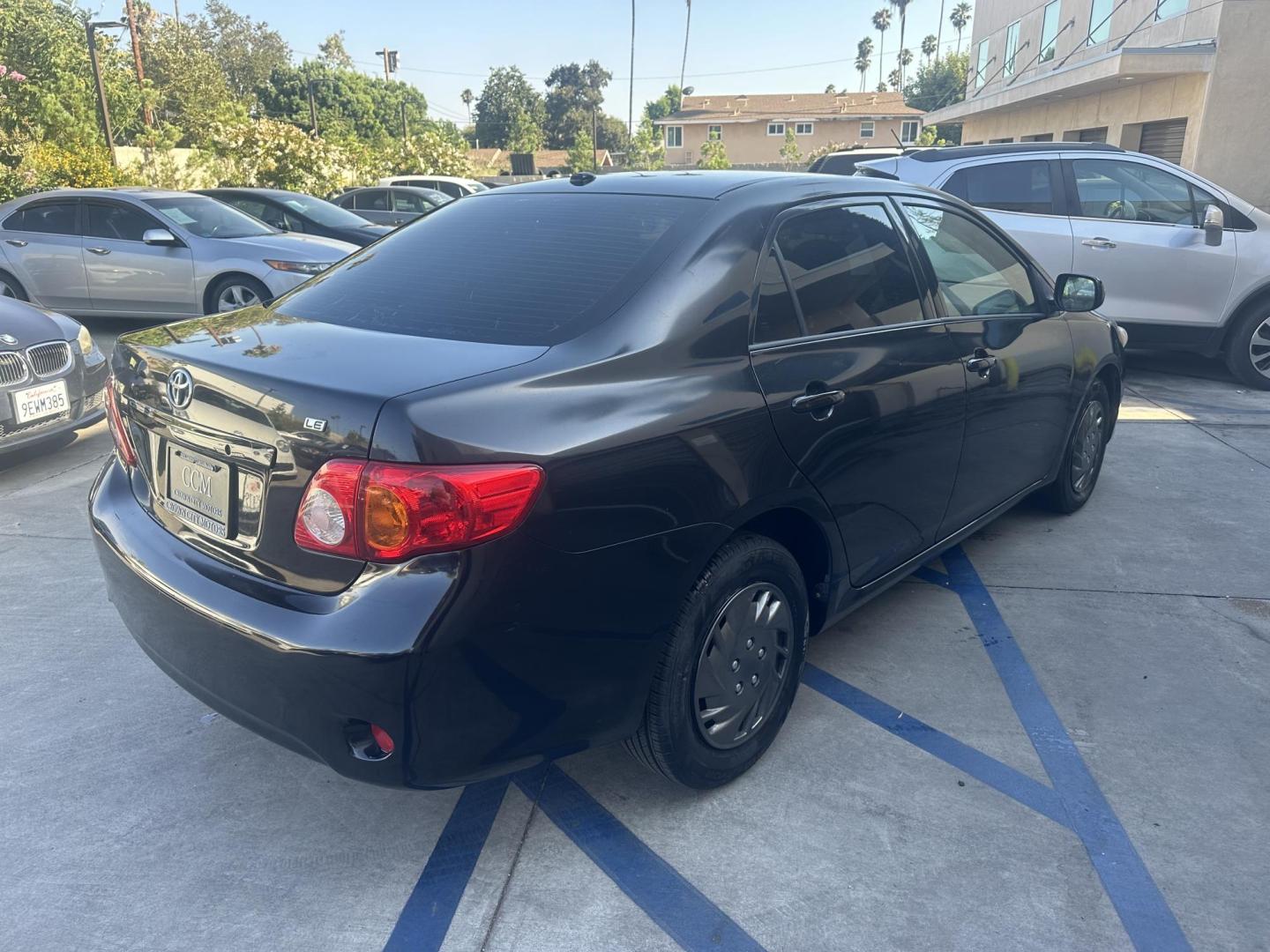 2010 Black /Gray Toyota Corolla Cloth (JTDBU4EE7A9) with an 4 Cylinder engine, Automatic transmission, located at 30 S. Berkeley Avenue, Pasadena, CA, 91107, (626) 248-7567, 34.145447, -118.109398 - MPG! This Corolla looks and drives well. - Photo#4