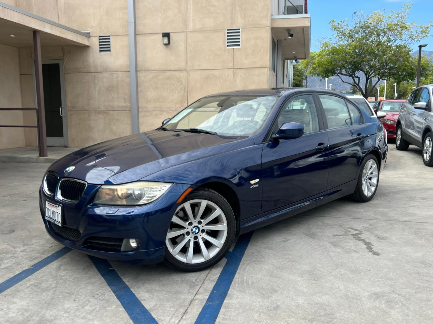 2011 BLUE /BEIGE BMW 3-Series 328i xDrive (WBAPK5C52BA) with an 3.0L L6 DOHC 24V engine, AUTOMATIC transmission, located at 30 S. Berkeley Avenue, Pasadena, CA, 91107, (626) 248-7567, 34.145447, -118.109398 - Crown City Motors is a used “Buy Here Pay Here” car dealer in Pasadena CA. “Buy Here Pay Here” financing, means that when you purchase your vehicle from our dealership, that you make the payments to the dealership as well. We do not need the banks approval to get you approved for a used auto - Photo#0