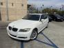 2011 WHITE /Tan BMW 3-Series 328i (WBAPH7C5XBE) with an 3.0L L6 DOHC 24V engine, Automatic transmission, located at 30 S. Berkeley Avenue, Pasadena, CA, 91107, (626) 248-7567, 34.145447, -118.109398 - Crown City Motors is a used “Buy Here Pay Here” car dealer in Pasadena CA. “Buy Here Pay Here” financing, means that when you purchase your vehicle from our dealership, that you make the payments to the dealership as well. We do not need the banks approval to get you approved for a used auto - Photo#0