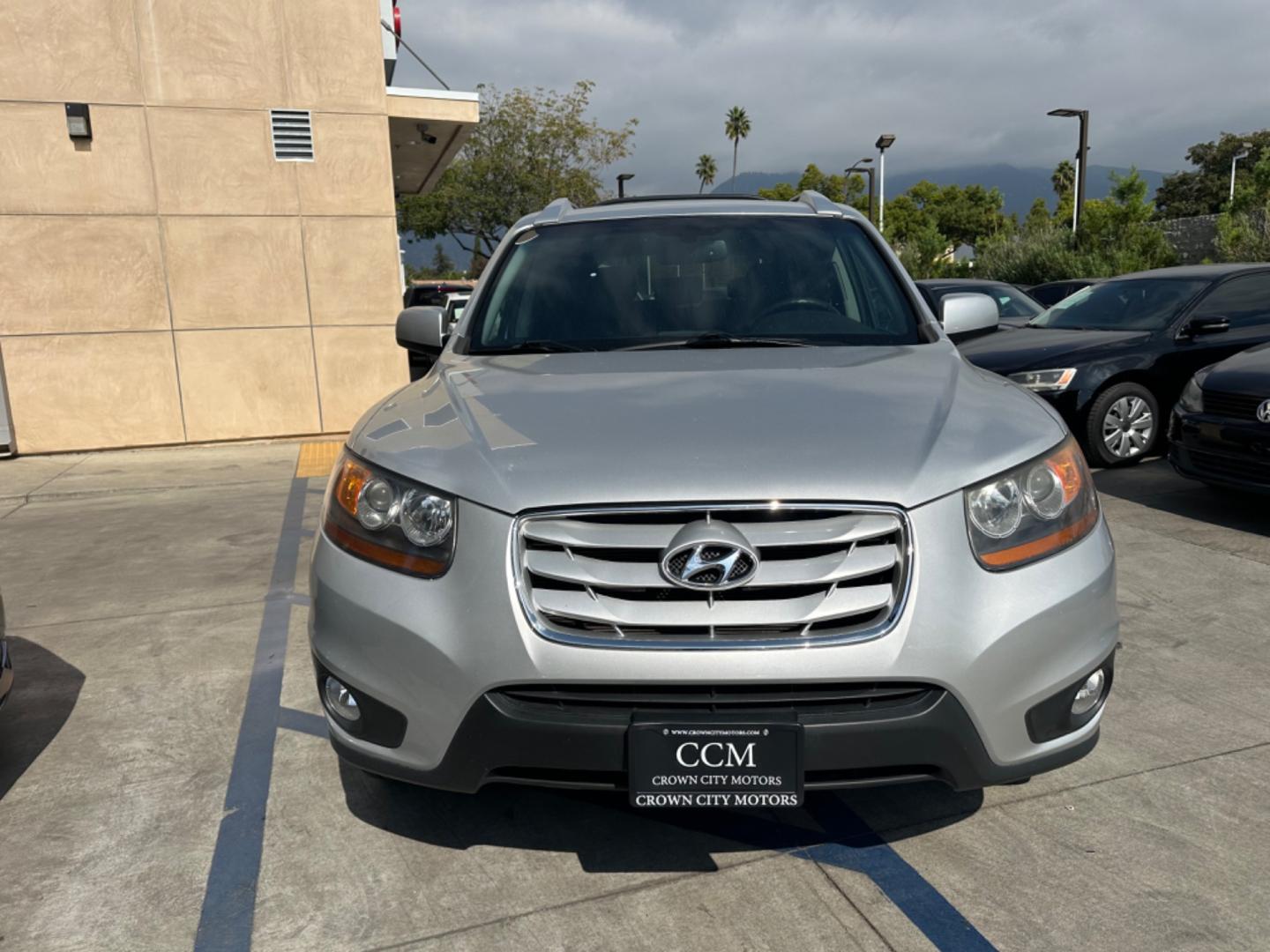 2011 Silver Hyundai Santa Fe Limited 3.5 4WD (5XYZKDAG3BG) with an 3.5L V6 DOHC 24V engine, 6-Speed Automatic transmission, located at 30 S. Berkeley Avenue, Pasadena, CA, 91107, (626) 248-7567, 34.145447, -118.109398 - Fully Loaded! Navigation, Alloys , Leather !! Crown City Motors is a used “Buy Here Pay Here” car dealer in Pasadena CA. “Buy Here Pay Here” financing, means that when you purchase your vehicle from our dealership, that you make the payments to the dealership as well. We do not need the ban - Photo#7