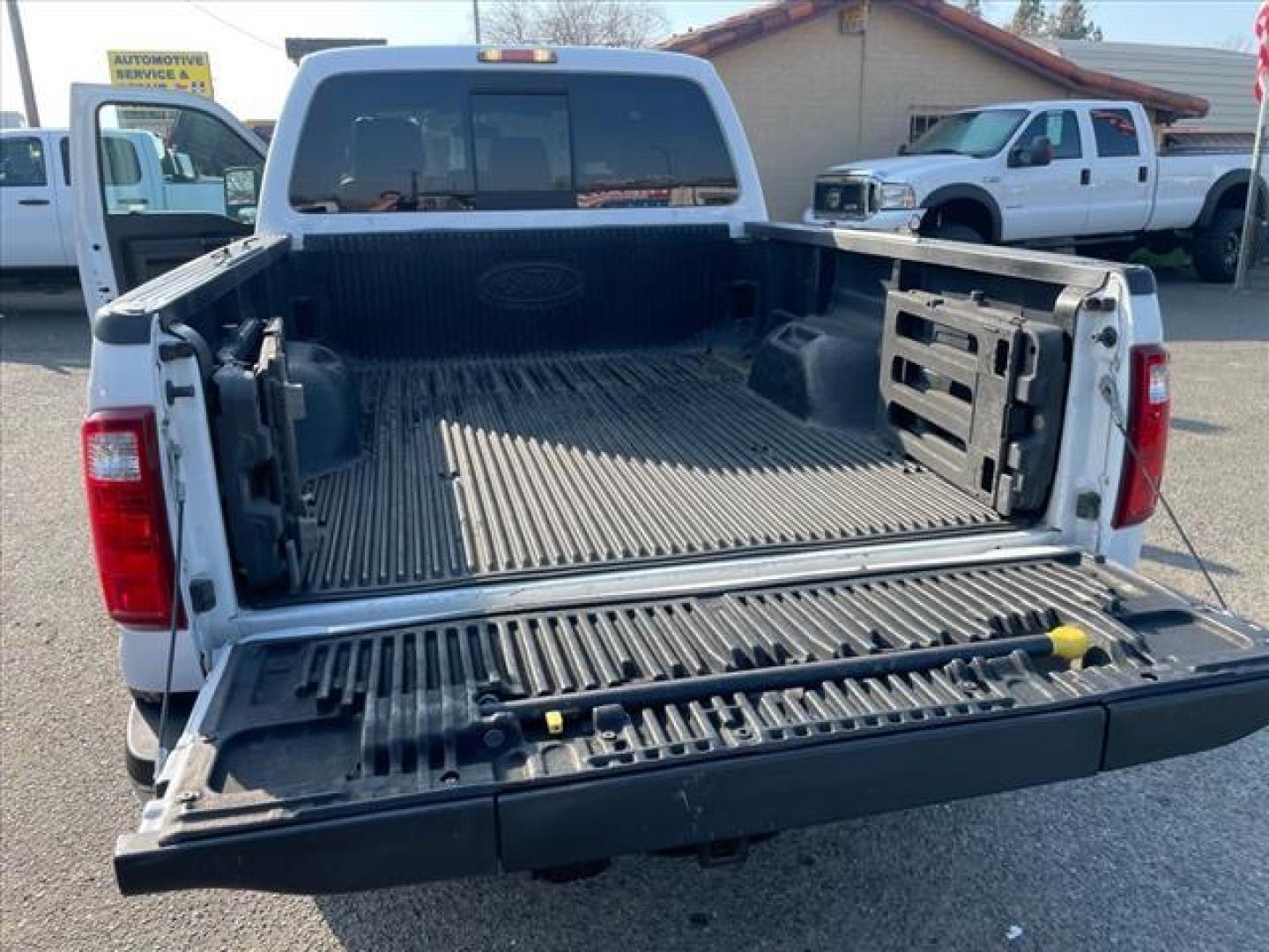 2011 Oxford White/Sterling Grey Ford F-250 Super Duty Lariat (1FT7W2BT3BE) with an 6.7L Power Stroke 6.7L Biodiesel Turbo V8 400hp 800ft. lbs. Common Rail Direct Injection engine, 6-Speed Shiftable Automatic transmission, located at 800 Riverside Ave, Roseville, CA, 95678, 916-773-4549 & Toll Free: 866-719-4393, 38.732265, -121.291039 - DIESEL CREW CAB 4X4 LARIAT ONE OWNER SERVICE RECORDS ON CLEAN CARFAX - Photo#9