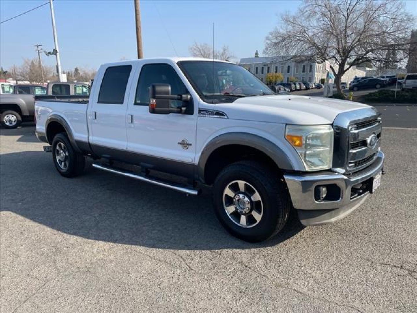 2011 Oxford White/Sterling Grey Ford F-250 Super Duty Lariat (1FT7W2BT3BE) with an 6.7L Power Stroke 6.7L Biodiesel Turbo V8 400hp 800ft. lbs. Common Rail Direct Injection engine, 6-Speed Shiftable Automatic transmission, located at 800 Riverside Ave, Roseville, CA, 95678, 916-773-4549 & Toll Free: 866-719-4393, 38.732265, -121.291039 - DIESEL CREW CAB 4X4 LARIAT ONE OWNER SERVICE RECORDS ON CLEAN CARFAX - Photo#1