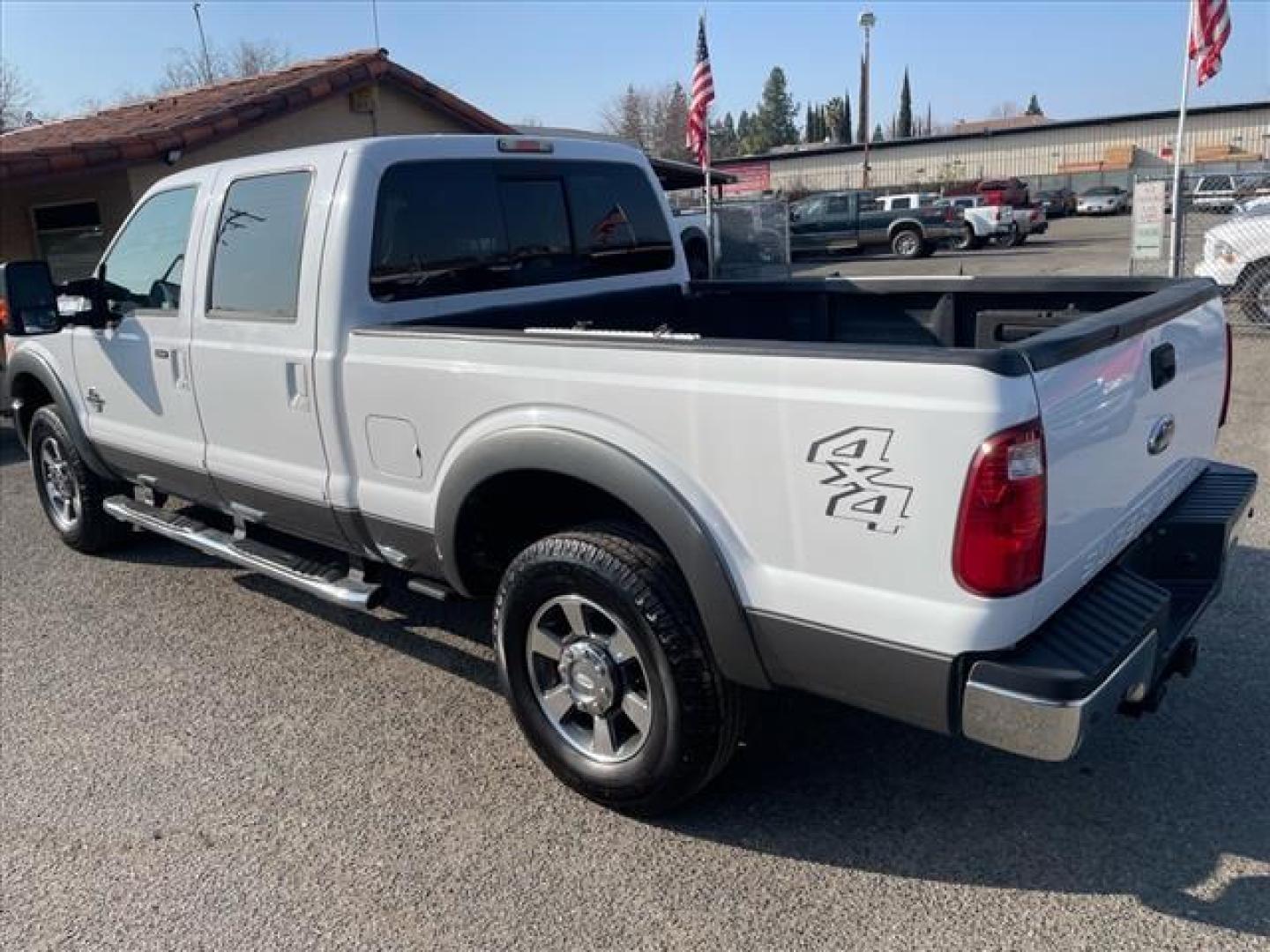 2011 Oxford White/Sterling Grey Ford F-250 Super Duty Lariat (1FT7W2BT3BE) with an 6.7L Power Stroke 6.7L Biodiesel Turbo V8 400hp 800ft. lbs. Common Rail Direct Injection engine, 6-Speed Shiftable Automatic transmission, located at 800 Riverside Ave, Roseville, CA, 95678, 916-773-4549 & Toll Free: 866-719-4393, 38.732265, -121.291039 - DIESEL CREW CAB 4X4 LARIAT ONE OWNER SERVICE RECORDS ON CLEAN CARFAX - Photo#2