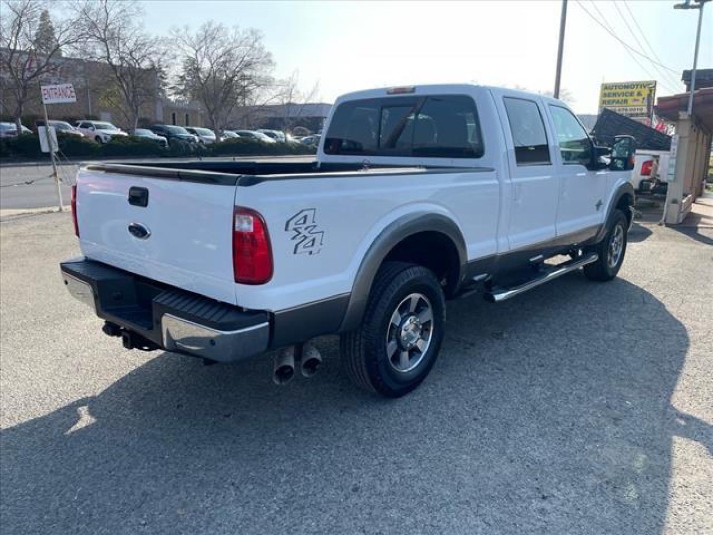 2011 Oxford White/Sterling Grey Ford F-250 Super Duty Lariat (1FT7W2BT3BE) with an 6.7L Power Stroke 6.7L Biodiesel Turbo V8 400hp 800ft. lbs. Common Rail Direct Injection engine, 6-Speed Shiftable Automatic transmission, located at 800 Riverside Ave, Roseville, CA, 95678, 916-773-4549 & Toll Free: 866-719-4393, 38.732265, -121.291039 - DIESEL CREW CAB 4X4 LARIAT ONE OWNER SERVICE RECORDS ON CLEAN CARFAX - Photo#3