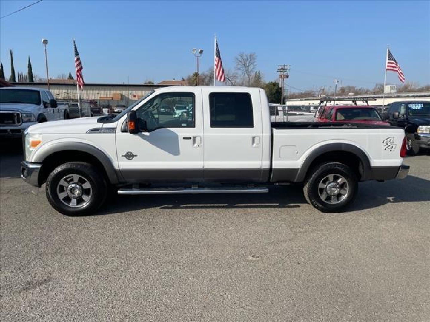 2011 Oxford White/Sterling Grey Ford F-250 Super Duty Lariat (1FT7W2BT3BE) with an 6.7L Power Stroke 6.7L Biodiesel Turbo V8 400hp 800ft. lbs. Common Rail Direct Injection engine, 6-Speed Shiftable Automatic transmission, located at 800 Riverside Ave, Roseville, CA, 95678, 916-773-4549 & Toll Free: 866-719-4393, 38.732265, -121.291039 - DIESEL CREW CAB 4X4 LARIAT ONE OWNER SERVICE RECORDS ON CLEAN CARFAX - Photo#4