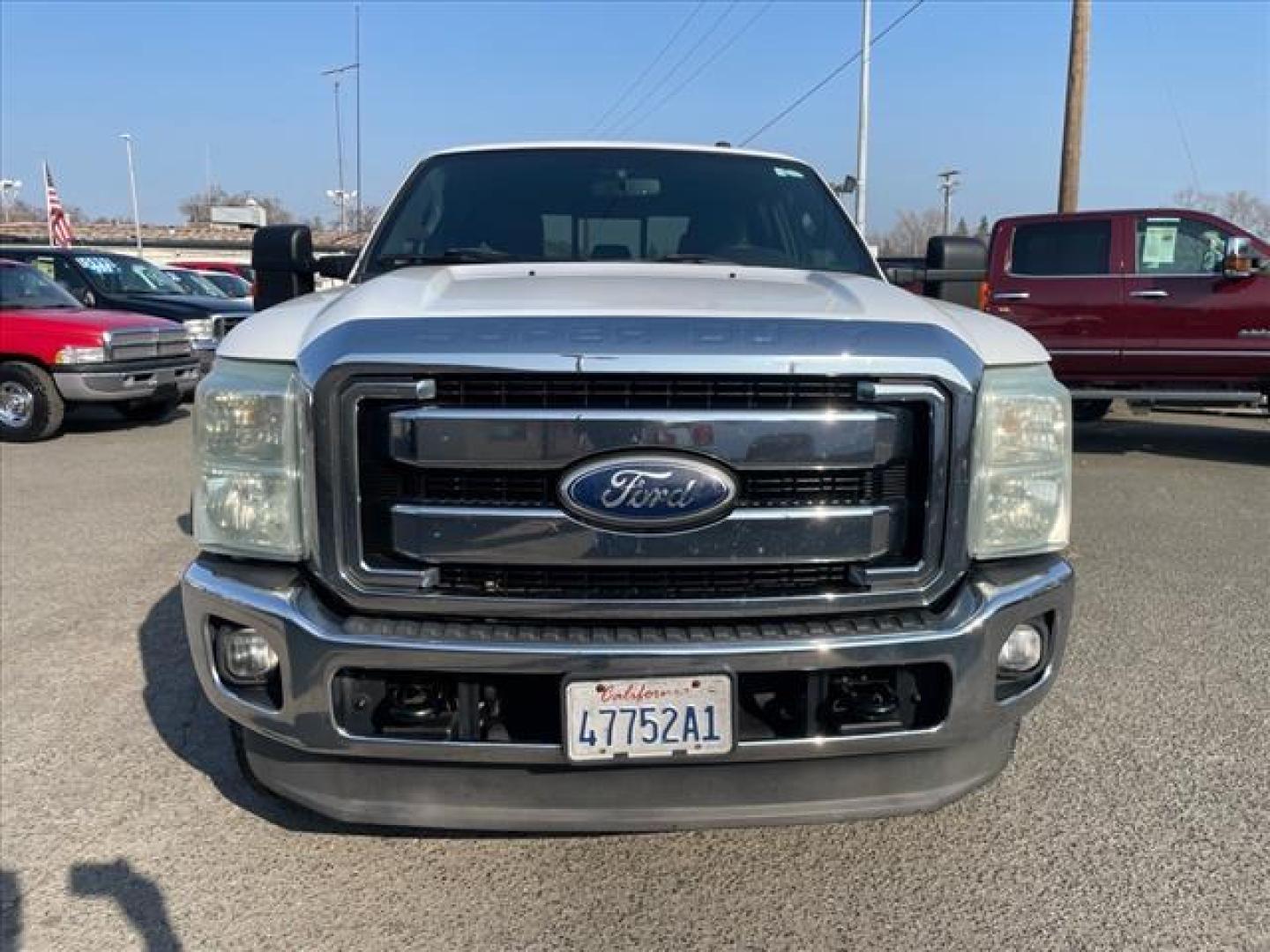 2011 Oxford White/Sterling Grey Ford F-250 Super Duty Lariat (1FT7W2BT3BE) with an 6.7L Power Stroke 6.7L Biodiesel Turbo V8 400hp 800ft. lbs. Common Rail Direct Injection engine, 6-Speed Shiftable Automatic transmission, located at 800 Riverside Ave, Roseville, CA, 95678, 916-773-4549 & Toll Free: 866-719-4393, 38.732265, -121.291039 - DIESEL CREW CAB 4X4 LARIAT ONE OWNER SERVICE RECORDS ON CLEAN CARFAX - Photo#7