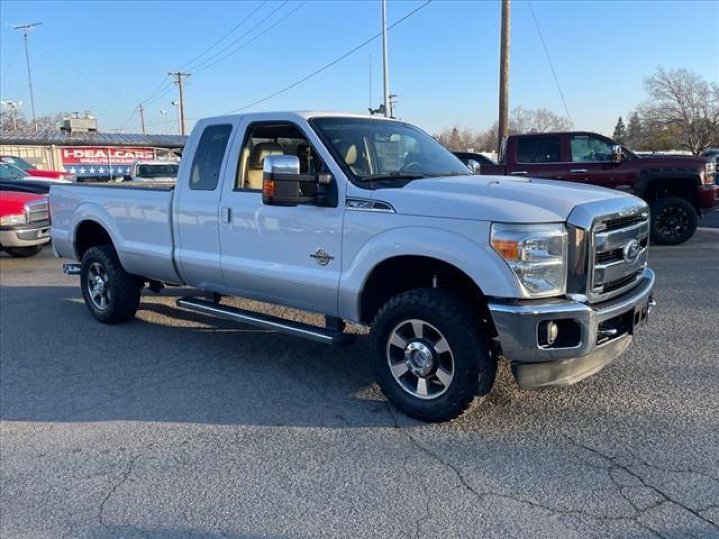 2011 Oxford White/Sterling Grey Ford F-350 Super Duty Lariat (1FT8X3BT9BE) with an 6.7L Power Stroke 6.7L Biodiesel Turbo V8 400hp 800ft. lbs. Common Rail Direct Injection engine, 6-Speed Shiftable Automatic transmission, located at 800 Riverside Ave, Roseville, CA, 95678, 916-773-4549 & Toll Free: 866-719-4393, 38.732265, -121.291039 - DIESEL SUPER CAB 4X4 LARIAT ONE OWNER SERVICE RECORDS ON CLEAN CARFAX - Photo#1