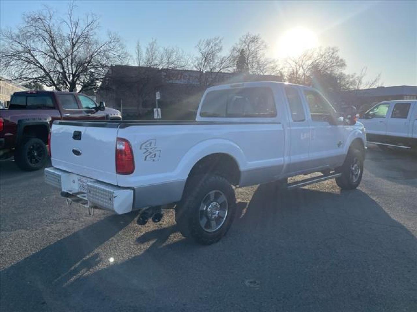 2011 Oxford White/Sterling Grey Ford F-350 Super Duty Lariat (1FT8X3BT9BE) with an 6.7L Power Stroke 6.7L Biodiesel Turbo V8 400hp 800ft. lbs. Common Rail Direct Injection engine, 6-Speed Shiftable Automatic transmission, located at 800 Riverside Ave, Roseville, CA, 95678, 916-773-4549 & Toll Free: 866-719-4393, 38.732265, -121.291039 - DIESEL SUPER CAB 4X4 LARIAT ONE OWNER SERVICE RECORDS ON CLEAN CARFAX - Photo#3