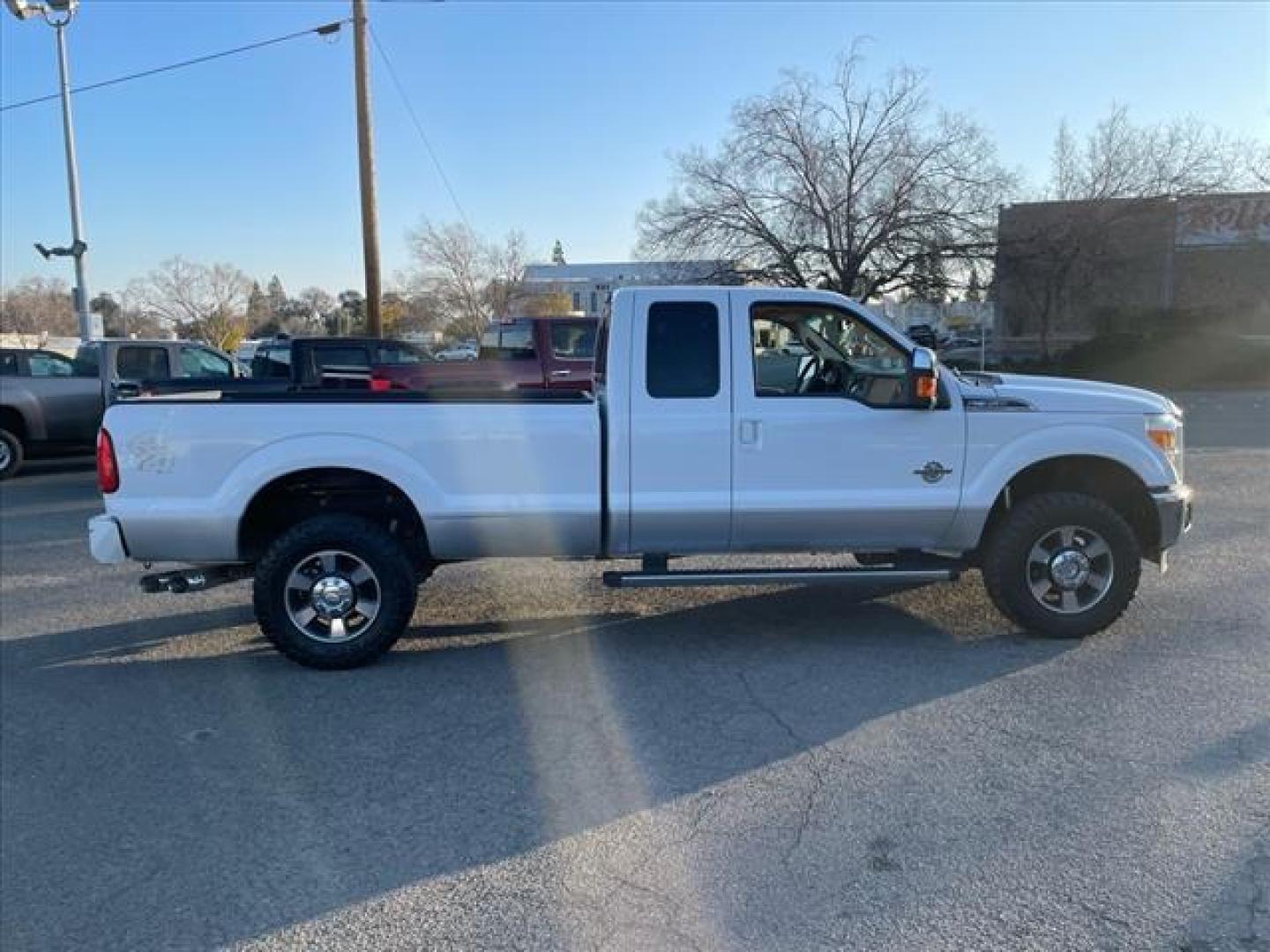 2011 Oxford White/Sterling Grey Ford F-350 Super Duty Lariat (1FT8X3BT9BE) with an 6.7L Power Stroke 6.7L Biodiesel Turbo V8 400hp 800ft. lbs. Common Rail Direct Injection engine, 6-Speed Shiftable Automatic transmission, located at 800 Riverside Ave, Roseville, CA, 95678, 916-773-4549 & Toll Free: 866-719-4393, 38.732265, -121.291039 - DIESEL SUPER CAB 4X4 LARIAT ONE OWNER SERVICE RECORDS ON CLEAN CARFAX - Photo#5