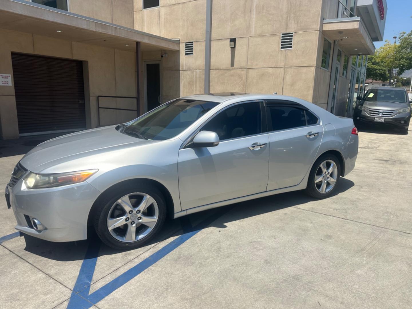 2012 Silver Metallic /Gray Acura TSX 5-Speed AT (JH4CU2F4XCC) with an 2.4L L4 DOHC 16V engine, 5-Speed Automatic transmission, located at 30 S. Berkeley Avenue, Pasadena, CA, 91107, (626) 248-7567, 34.145447, -118.109398 - Bluetooth Connection! Moon-roof! new tires! Low Miles! This 2012 Acura TSX 5-Speed AT looks and drives good. Bad credit? We can help! We are the bank. All our cars are thoroughly inspected and reconditioned by our technicians. FREE CARFAX report. Stop by or call to speak with our friendly staff. W - Photo#1