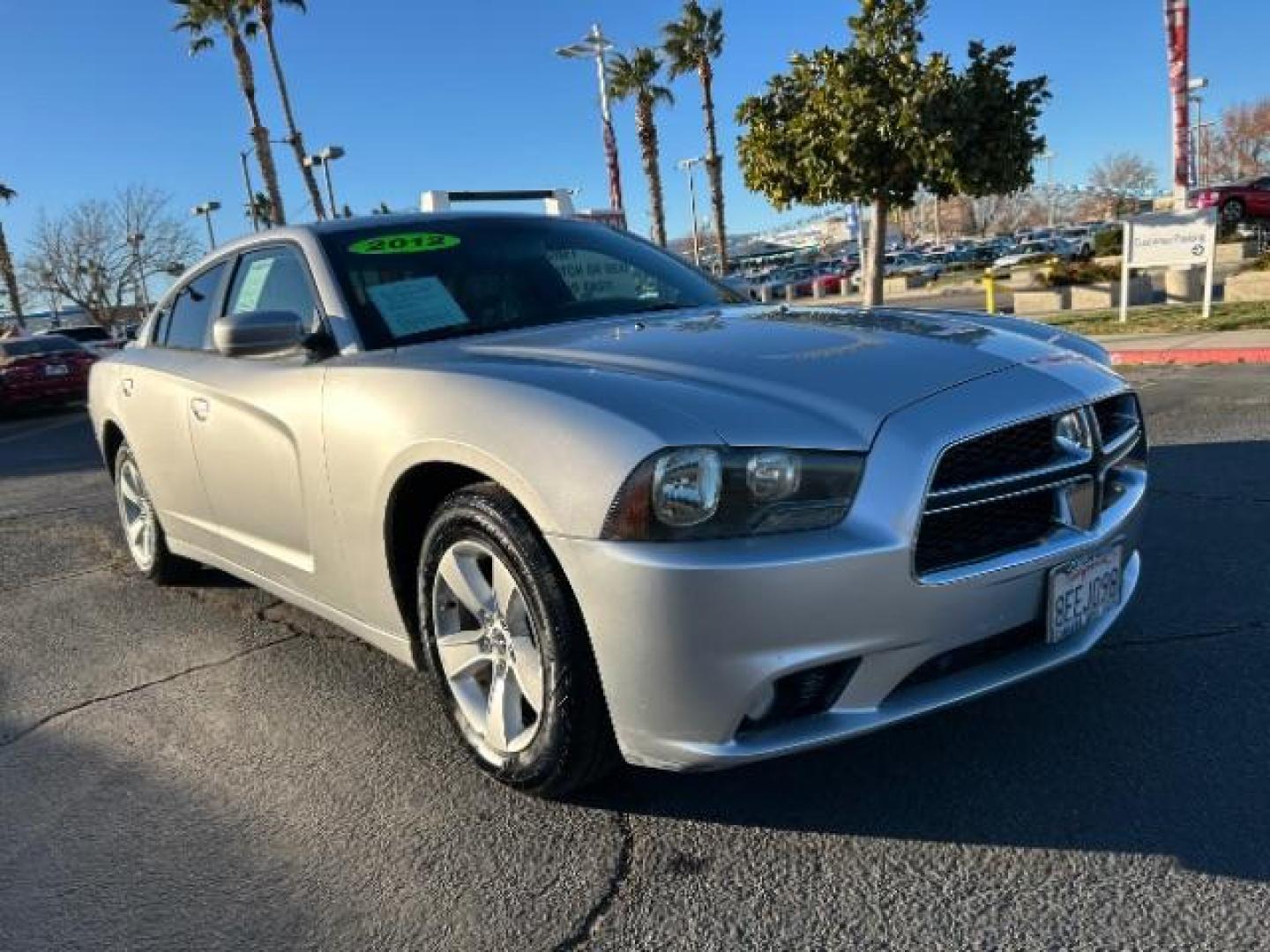 2012 SILVER Dodge Charger (2C3CDXHG7CH) with an V6 3.6 Liter engine, Automatic 8-Spd transmission, located at 412 Auto Vista Drive, Palmdale, 93551, (661) 945-0620, 34.592636, -118.136681 - Photo#0