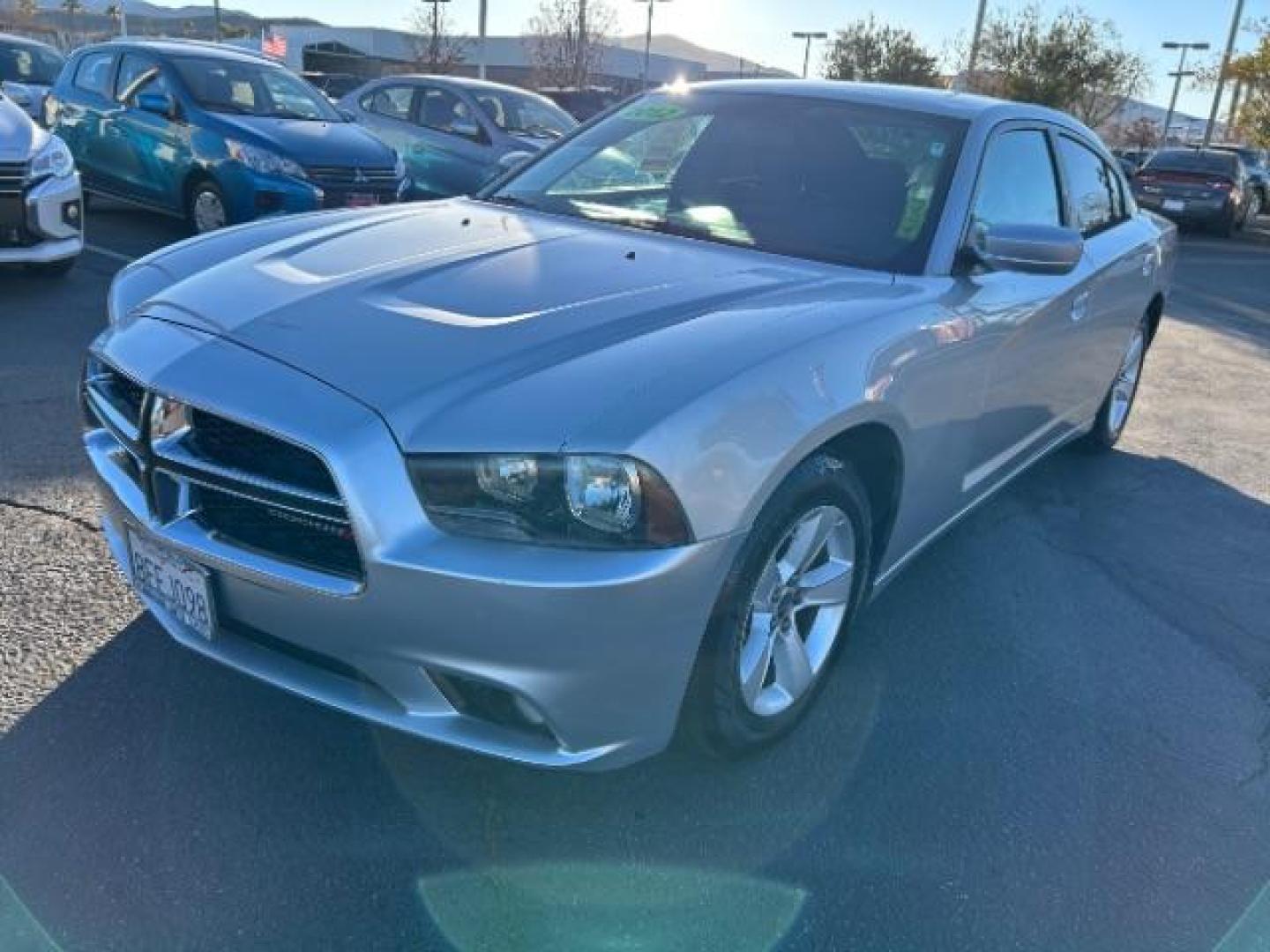 2012 SILVER Dodge Charger (2C3CDXHG7CH) with an V6 3.6 Liter engine, Automatic 8-Spd transmission, located at 412 Auto Vista Drive, Palmdale, 93551, (661) 945-0620, 34.592636, -118.136681 - Photo#2