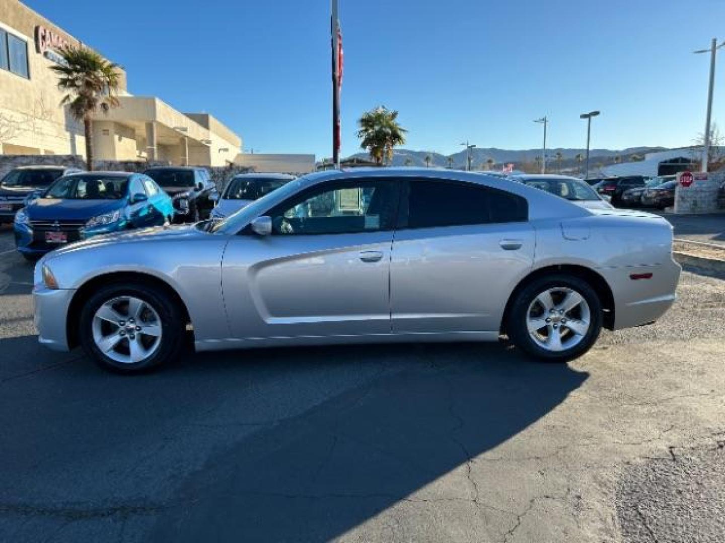 2012 SILVER Dodge Charger (2C3CDXHG7CH) with an V6 3.6 Liter engine, Automatic 8-Spd transmission, located at 412 Auto Vista Drive, Palmdale, 93551, (661) 945-0620, 34.592636, -118.136681 - Photo#3