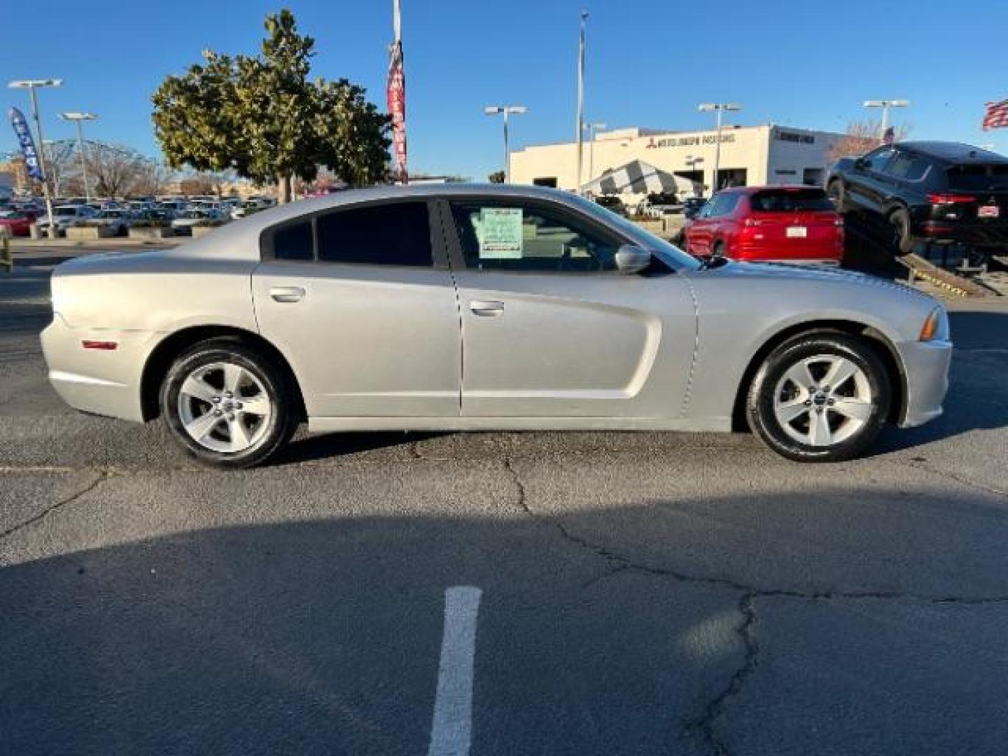 2012 SILVER Dodge Charger (2C3CDXHG7CH) with an V6 3.6 Liter engine, Automatic 8-Spd transmission, located at 412 Auto Vista Drive, Palmdale, 93551, (661) 945-0620, 34.592636, -118.136681 - Photo#7