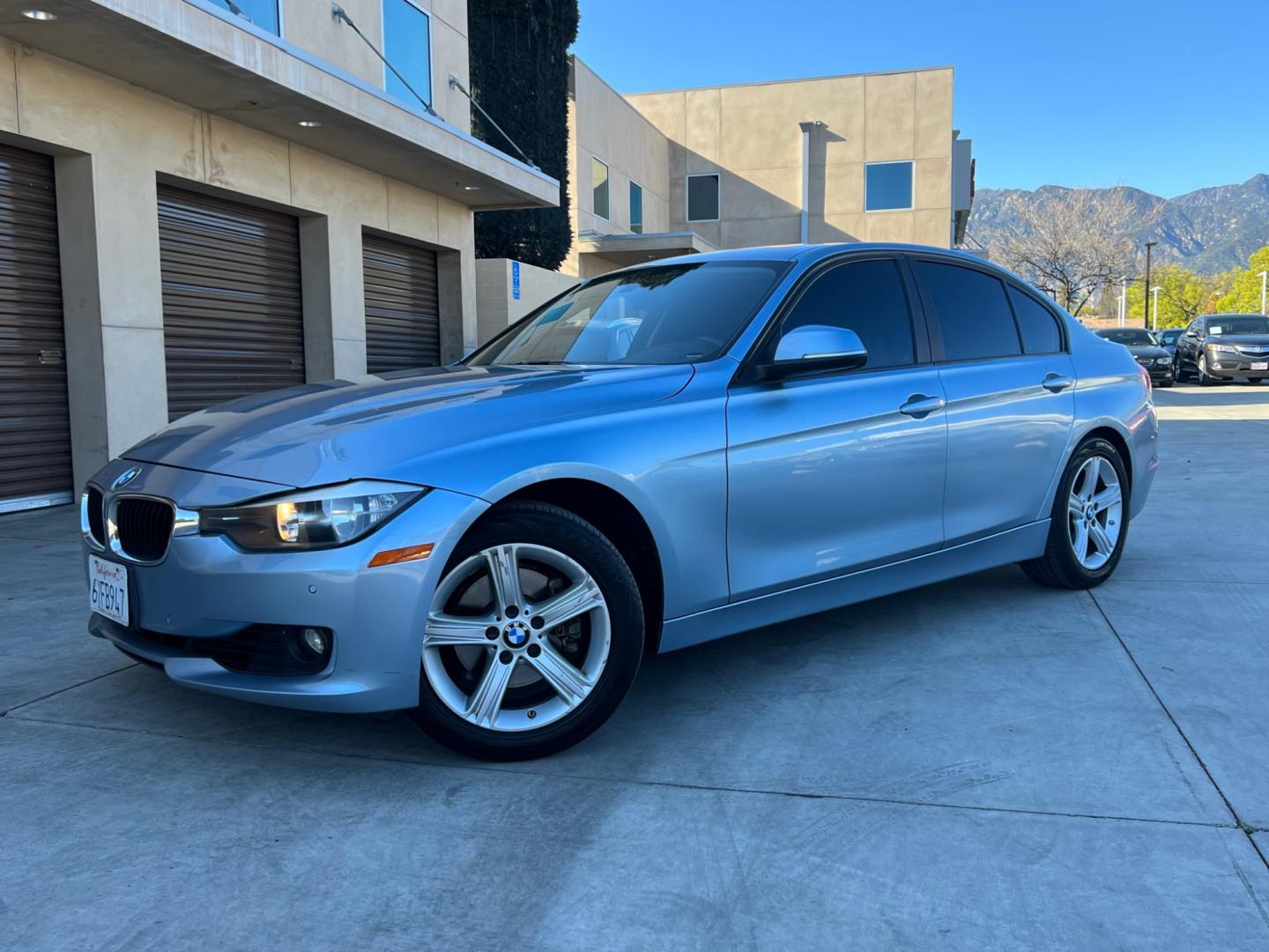 2013 BLUE /black leather BMW 3-Series 328i Sedan (WBA3A5C58DF) with an 2.0L L4 DOHC 16V engine, 8-Speed Automatic transmission, located at 30 S. Berkeley Avenue, Pasadena, CA, 91107, (626) 248-7567, 34.145447, -118.109398 - Looking for a luxurious and high-performing car that comes loaded with all the latest features? Look no further than the 2013 BMW 3-Series 328i Sedan, available at Crown City Motors. This stunning sedan is not only a head-turner on the road, but it also comes with all the latest features that you co - Photo#0