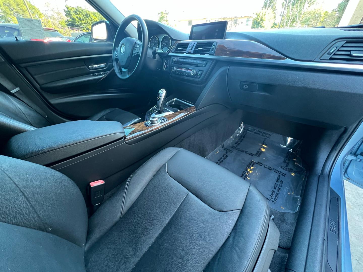 2013 BLUE /black leather BMW 3-Series 328i Sedan (WBA3A5C58DF) with an 2.0L L4 DOHC 16V engine, 8-Speed Automatic transmission, located at 30 S. Berkeley Avenue, Pasadena, CA, 91107, (626) 248-7567, 34.145447, -118.109398 - Looking for a luxurious and high-performing car that comes loaded with all the latest features? Look no further than the 2013 BMW 3-Series 328i Sedan, available at Crown City Motors. This stunning sedan is not only a head-turner on the road, but it also comes with all the latest features that you co - Photo#14