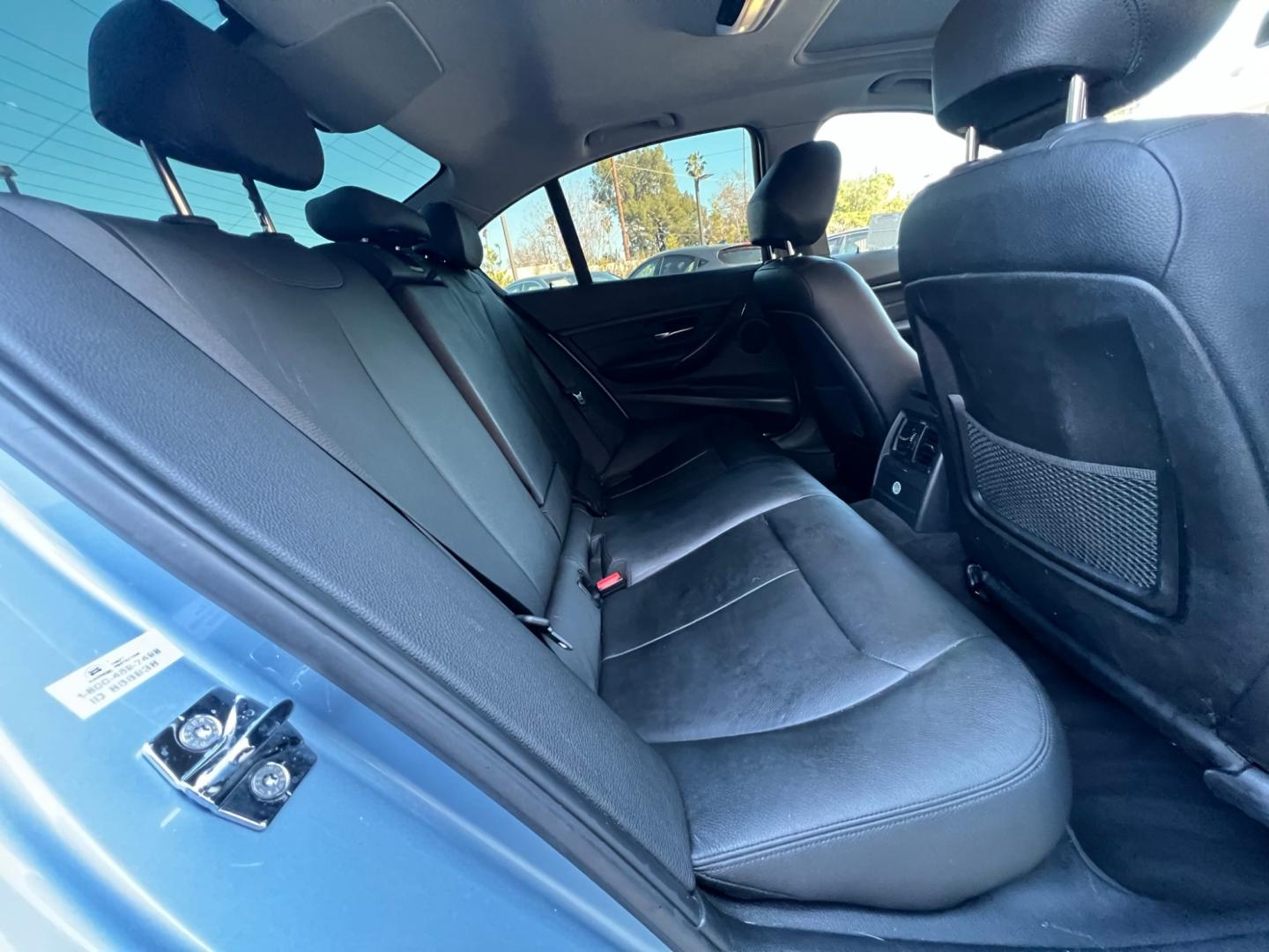 2013 BLUE /black leather BMW 3-Series 328i Sedan (WBA3A5C58DF) with an 2.0L L4 DOHC 16V engine, 8-Speed Automatic transmission, located at 30 S. Berkeley Avenue, Pasadena, CA, 91107, (626) 248-7567, 34.145447, -118.109398 - Looking for a luxurious and high-performing car that comes loaded with all the latest features? Look no further than the 2013 BMW 3-Series 328i Sedan, available at Crown City Motors. This stunning sedan is not only a head-turner on the road, but it also comes with all the latest features that you co - Photo#15