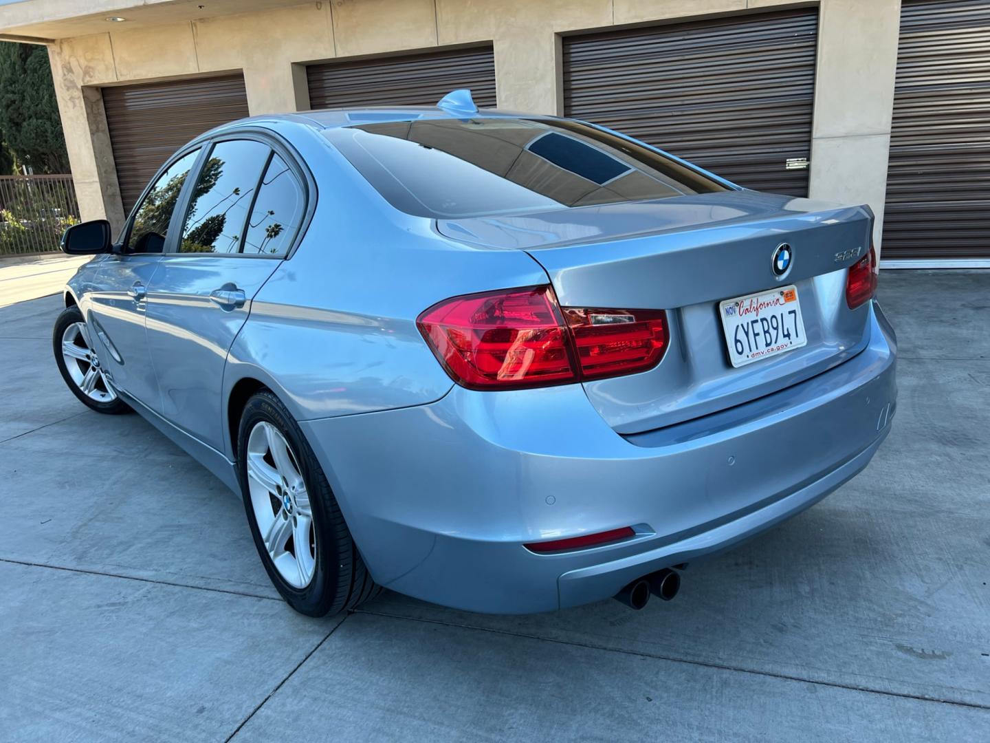 2013 BLUE /black leather BMW 3-Series 328i Sedan (WBA3A5C58DF) with an 2.0L L4 DOHC 16V engine, 8-Speed Automatic transmission, located at 30 S. Berkeley Avenue, Pasadena, CA, 91107, (626) 248-7567, 34.145447, -118.109398 - Looking for a luxurious and high-performing car that comes loaded with all the latest features? Look no further than the 2013 BMW 3-Series 328i Sedan, available at Crown City Motors. This stunning sedan is not only a head-turner on the road, but it also comes with all the latest features that you co - Photo#2