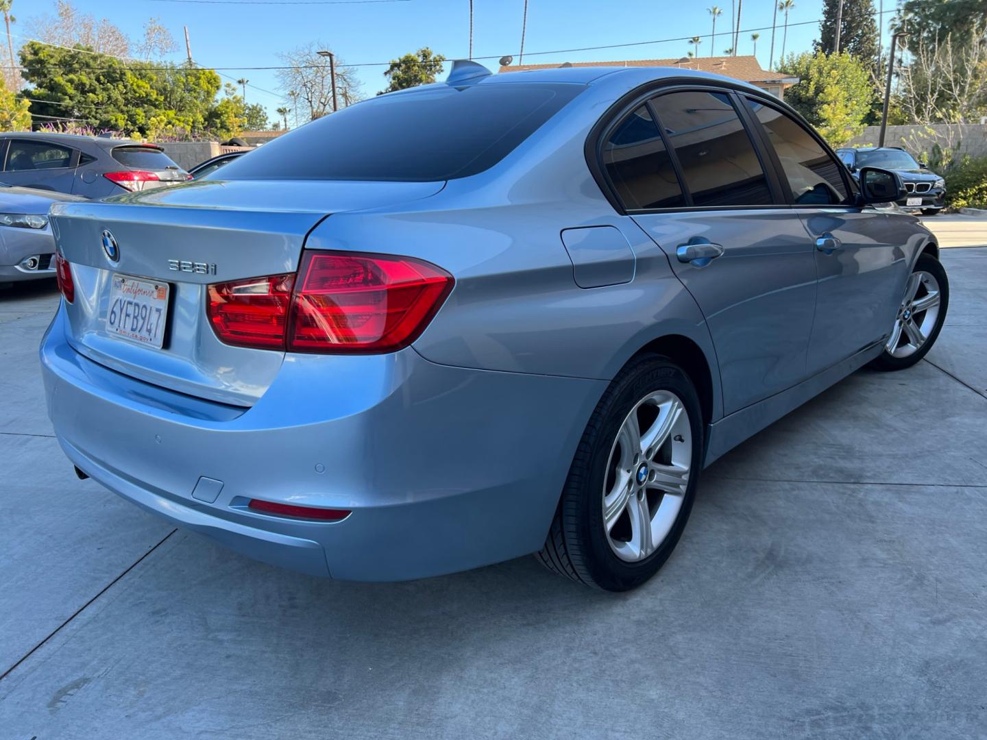 2013 BLUE /black leather BMW 3-Series 328i Sedan (WBA3A5C58DF) with an 2.0L L4 DOHC 16V engine, 8-Speed Automatic transmission, located at 30 S. Berkeley Avenue, Pasadena, CA, 91107, (626) 248-7567, 34.145447, -118.109398 - Looking for a luxurious and high-performing car that comes loaded with all the latest features? Look no further than the 2013 BMW 3-Series 328i Sedan, available at Crown City Motors. This stunning sedan is not only a head-turner on the road, but it also comes with all the latest features that you co - Photo#6