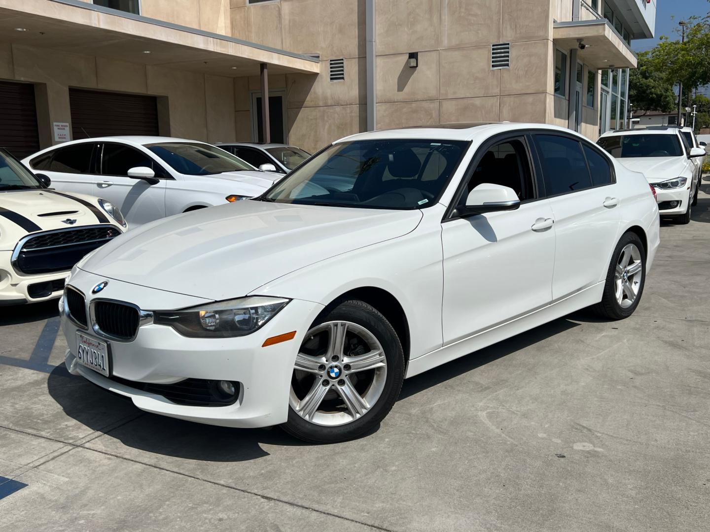 2013 White BMW 3-Series 328i Sedan (WBA3C1C52DF) with an 2.0L L4 DOHC 16V engine, AUTOMATIC transmission, located at 30 S. Berkeley Avenue, Pasadena, CA, 91107, (626) 248-7567, 34.145447, -118.109398 - Crown City Motors is a used “Buy Here Pay Here” car dealer in Pasadena CA. “Buy Here Pay Here” financing, means that when you purchase your vehicle from our dealership, that you make the payments to the dealership as well. We do not need the banks approval to get you approved for a used auto - Photo#0