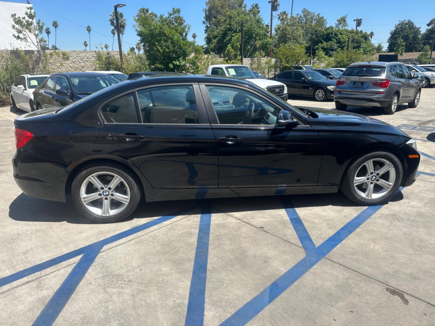 2013 Black Sapphire Metallic /Black BMW 3-Series Leather (WBA3C1C57DF) with an 2.0 engine, Automatic transmission, located at 30 S. Berkeley Avenue, Pasadena, CA, 91107, (626) 248-7567, 34.145447, -118.109398 - New Tires!! Low Miles!! Discover the 2013 BMW 328i 4-Door Sedan: Luxury and Performance at an Affordable Price Are you in the market for a luxury vehicle that combines high performance, advanced technology, and affordability? The 2013 BMW 328i 4-Door Sedan is the perfect choice for you. This outst - Photo#6