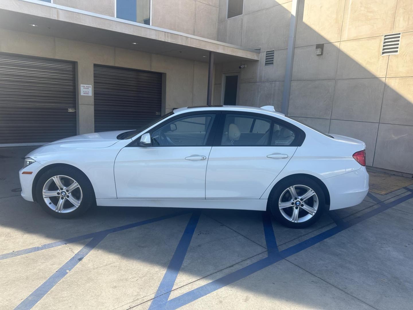 2013 White /Tan BMW 3-Series Leather (WBA3C3C56DF) with an 4 Cylinder engine, Automatic transmission, located at 30 S. Berkeley Avenue, Pasadena, CA, 91107, (626) 248-7567, 34.145447, -118.109398 - Low Miles! Leather seats! ntroducing the 2013 BMW 3-Series 320i Sedan, a timeless blend of luxury, performance, and style. With its sleek design and impressive features, this vehicle is sure to turn heads on the road. And with only 88,248 miles on the odometer, it's a low-mileage gem, especially f - Photo#2