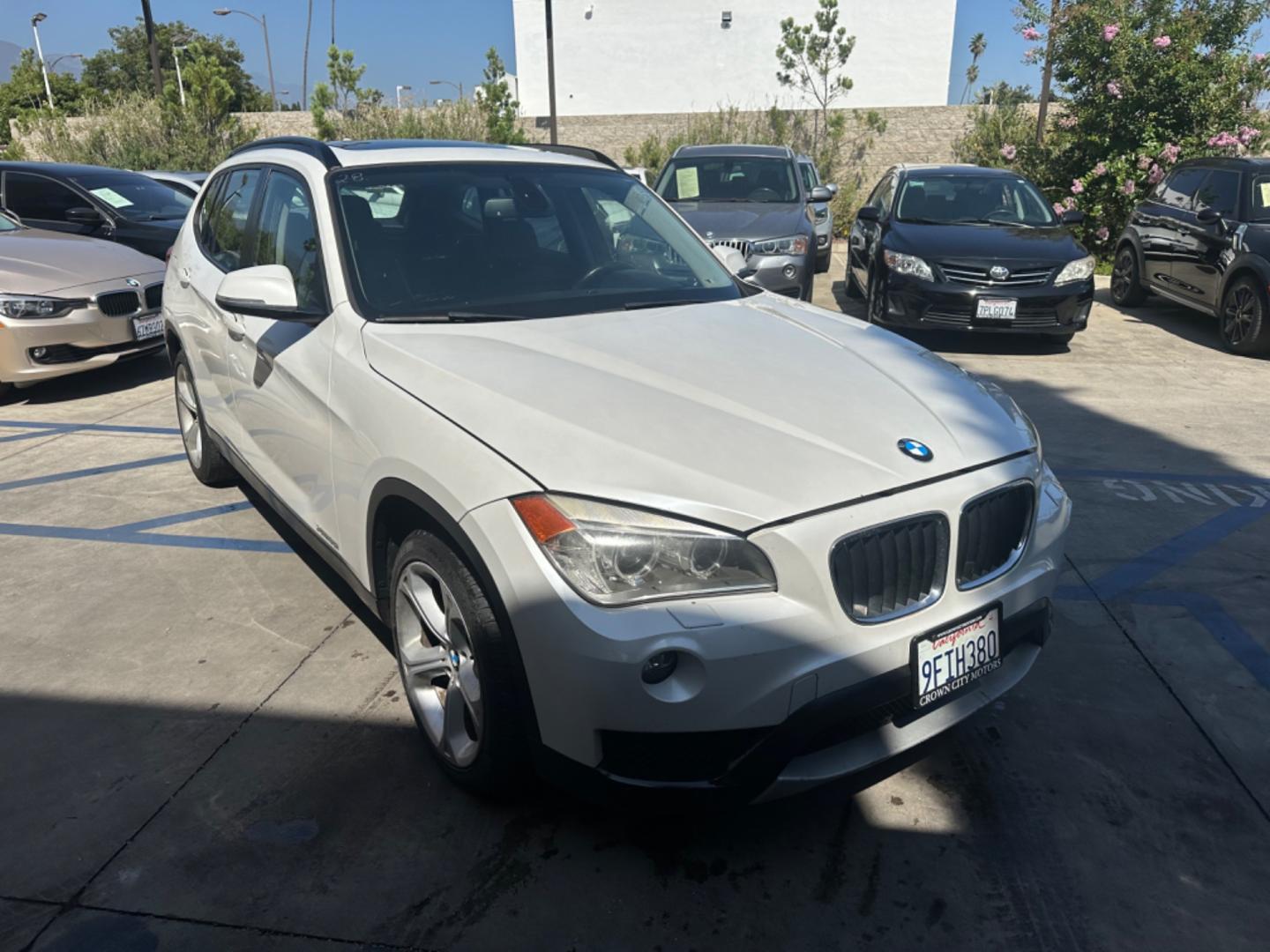 2013 WHITE /Tan BMW X1 xDrive35i (WBAVM5C54DV) with an 3.0L L6 DOHC 24V engine, 6-Speed Automatic transmission, located at 30 S. Berkeley Avenue, Pasadena, CA, 91107, (626) 248-7567, 34.145447, -118.109398 - Navigation! Panoramic-roof! Back up camera! Premium package! AWD! This 2013 BMW X1 xDrive35i looks and drives well. - Photo#6