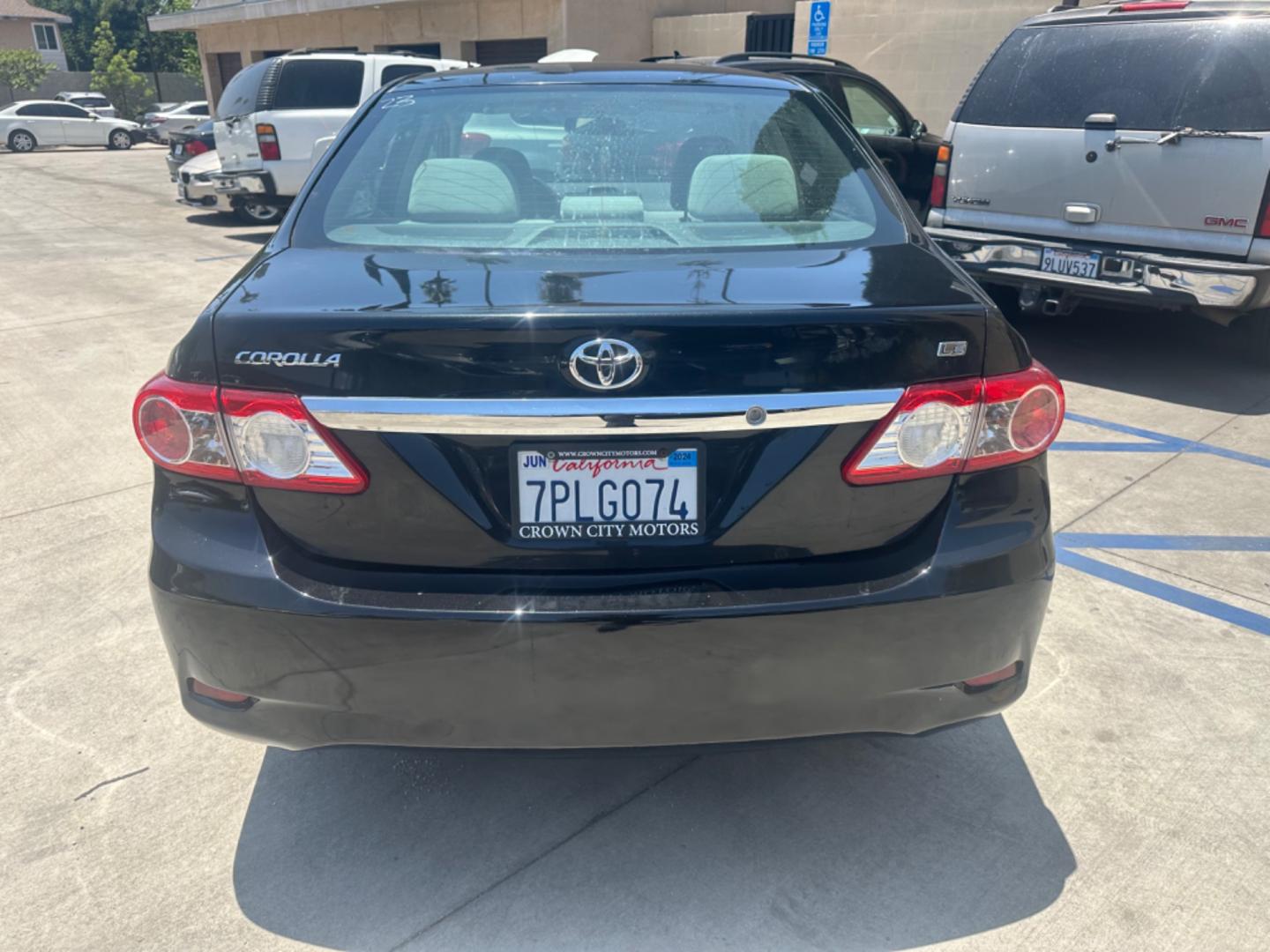 2013 Black /Black Toyota Corolla LE 4-Speed AT (5YFBU4EE0DP) with an 1.8L L4 DOHC 16V engine, 4-Speed Automatic transmission, located at 30 S. Berkeley Avenue, Pasadena, CA, 91107, (626) 248-7567, 34.145447, -118.109398 - Photo#4