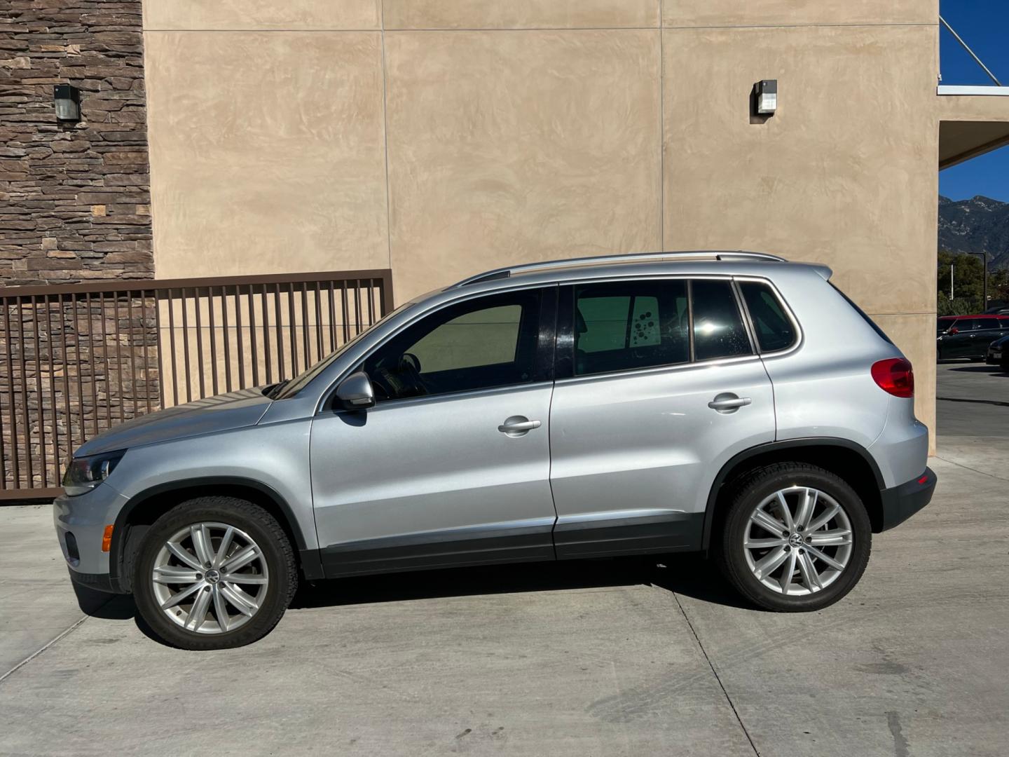 2013 Silver /BLACK Volkswagen Tiguan 2.0T S 4Motion (WVGBV7AX5DW) with an 2.0L L4 DOHC 16V TURBO engine, 6-Speed Automatic transmission, located at 30 S. Berkeley Avenue, Pasadena, CA, 91107, (626) 248-7567, 34.145447, -118.109398 - Looking for a reliable car, truck, or SUV in the heart of Pasadena, CA? The 2013 Volkswagen Tiguan 2.0T S 4Motion may be the answer you've been seeking. This SUV isn’t just a mode of transportation; it’s an emblem of style, power, and durability, right from a trusted BHPH dealer in Pasadena. For - Photo#1