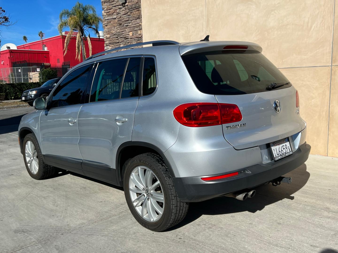 2013 Silver /BLACK Volkswagen Tiguan 2.0T S 4Motion (WVGBV7AX5DW) with an 2.0L L4 DOHC 16V TURBO engine, 6-Speed Automatic transmission, located at 30 S. Berkeley Avenue, Pasadena, CA, 91107, (626) 248-7567, 34.145447, -118.109398 - Looking for a reliable car, truck, or SUV in the heart of Pasadena, CA? The 2013 Volkswagen Tiguan 2.0T S 4Motion may be the answer you've been seeking. This SUV isn’t just a mode of transportation; it’s an emblem of style, power, and durability, right from a trusted BHPH dealer in Pasadena. For - Photo#2