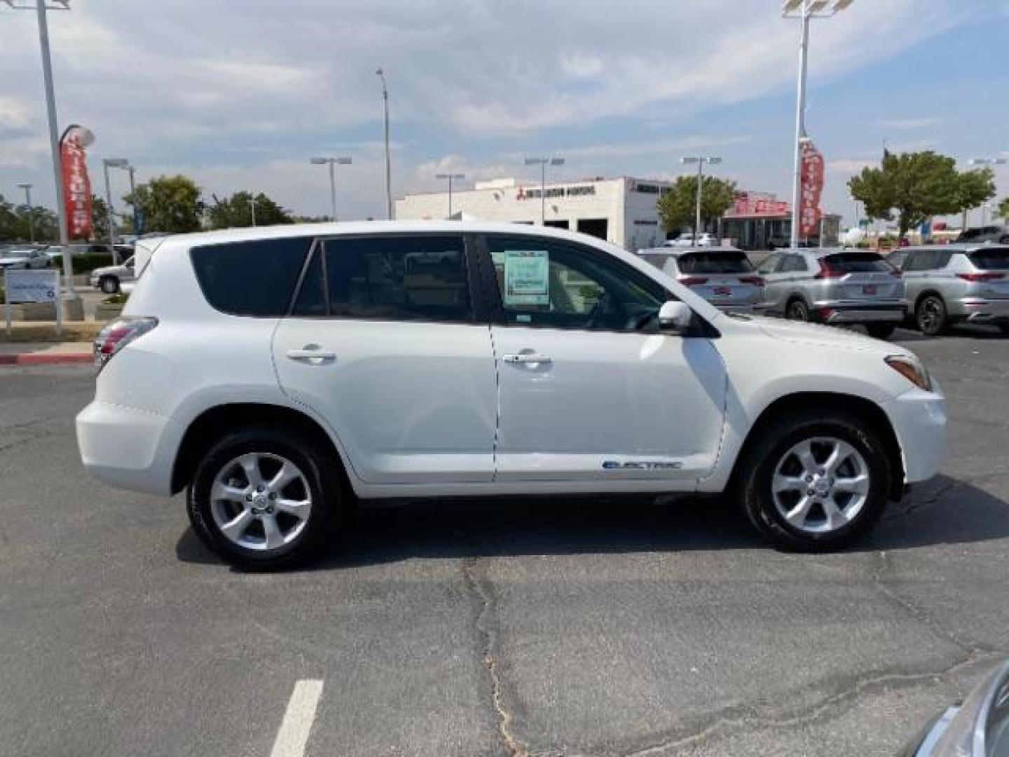 2013 WHITE Toyota RAV4 EV (2T3YL4DV2DW) with an AC Electric Motor engine, Single-Speed Fixed Gear transmission, located at 412 Auto Vista Drive, Palmdale, 93551, (661) 945-0620, 34.592636, -118.136681 - Photo#7