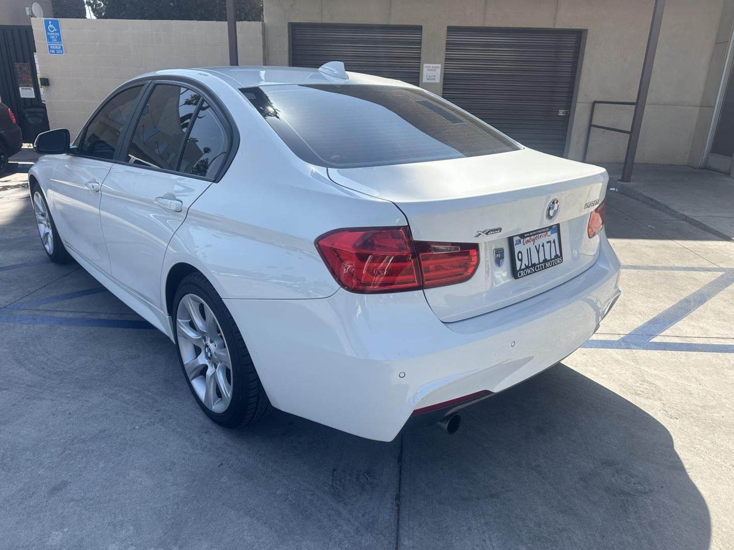 2014 White BMW 3-Series 320i xDrive (WBA3C3C54EK) with an 2.0L L4 DOHC 16V engine, AUTOMATIC transmission, located at 30 S. Berkeley Avenue, Pasadena, CA, 91107, (626) 248-7567, 34.145447, -118.109398 - Crown City Motors is a used “Buy Here Pay Here” car dealer in Pasadena CA. “Buy Here Pay Here” financing, means that when you purchase your vehicle from our dealership, that you make the payments to the dealership as well. We do not need the banks approval to get you approved for a used auto - Photo#2