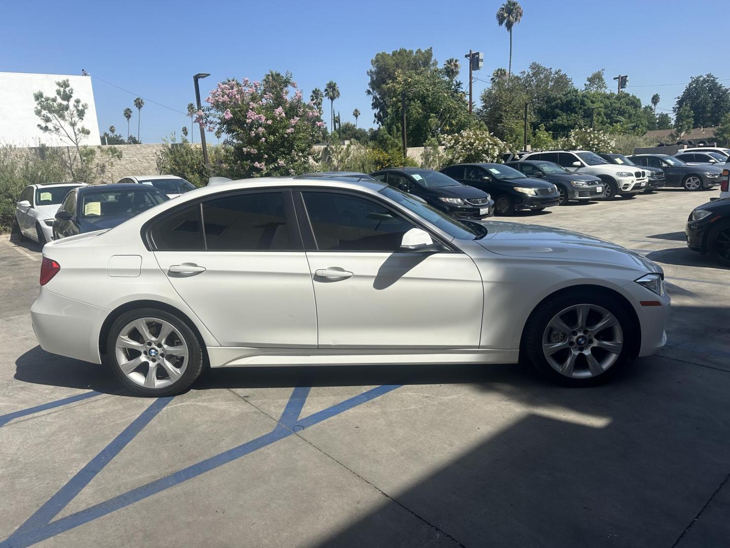 2014 White BMW 3-Series 320i xDrive (WBA3C3C54EK) with an 2.0L L4 DOHC 16V engine, AUTOMATIC transmission, located at 30 S. Berkeley Avenue, Pasadena, CA, 91107, (626) 248-7567, 34.145447, -118.109398 - Crown City Motors is a used “Buy Here Pay Here” car dealer in Pasadena CA. “Buy Here Pay Here” financing, means that when you purchase your vehicle from our dealership, that you make the payments to the dealership as well. We do not need the banks approval to get you approved for a used auto - Photo#6