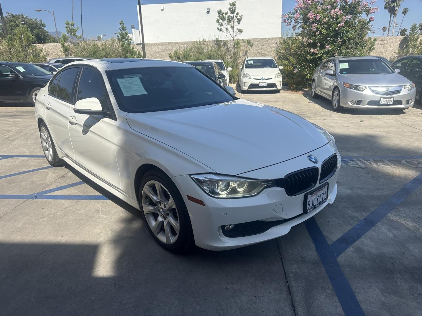 2014 White BMW 3-Series 320i xDrive (WBA3C3C54EK) with an 2.0L L4 DOHC 16V engine, AUTOMATIC transmission, located at 30 S. Berkeley Avenue, Pasadena, CA, 91107, (626) 248-7567, 34.145447, -118.109398 - Crown City Motors is a used “Buy Here Pay Here” car dealer in Pasadena CA. “Buy Here Pay Here” financing, means that when you purchase your vehicle from our dealership, that you make the payments to the dealership as well. We do not need the banks approval to get you approved for a used auto - Photo#8