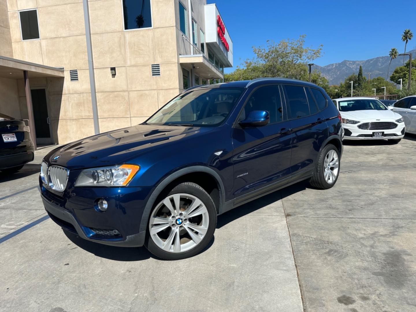 2014 BLUE /BLUE BMW X3 xDrive35i (5UXWX7C50E0) with an 3.0L L6 DOHC 24V engine, 8-Speed Automatic transmission, located at 30 S. Berkeley Avenue, Pasadena, CA, 91107, (626) 248-7567, 34.145447, -118.109398 - Crown City Motors is a used “Buy Here Pay Here” car dealer in Pasadena CA. “Buy Here Pay Here” financing, means that when you purchase your vehicle from our dealership, that you make the payments to the dealership as well. We do not need the banks approval to get you approved for a used auto - Photo#0