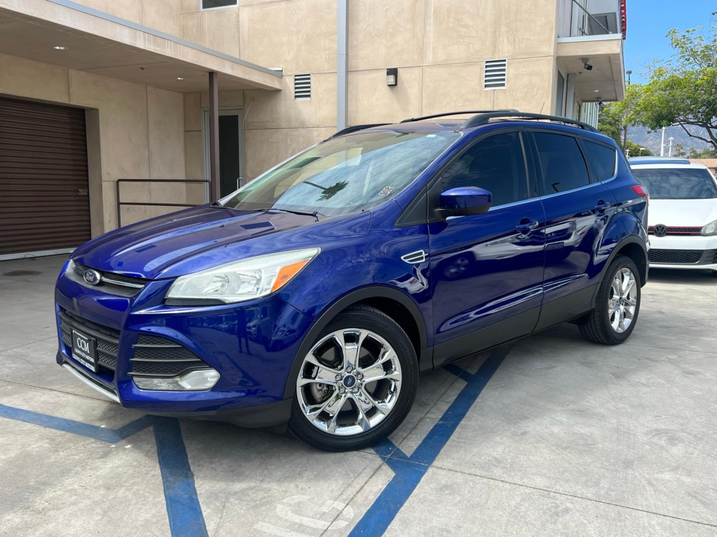 2014 BLUE Ford Escape SE (1FMCU0G94EU) , AUTOMATIC transmission, located at 30 S. Berkeley Avenue, Pasadena, CA, 91107, (626) 248-7567, 34.145447, -118.109398 - Crown City Motors is a used “Buy Here Pay Here” car dealer in Pasadena CA. “Buy Here Pay Here” financing, means that when you purchase your vehicle from our dealership, that you make the payments to the dealership as well. We do not need the banks approval to get you approved for a used auto - Photo#0