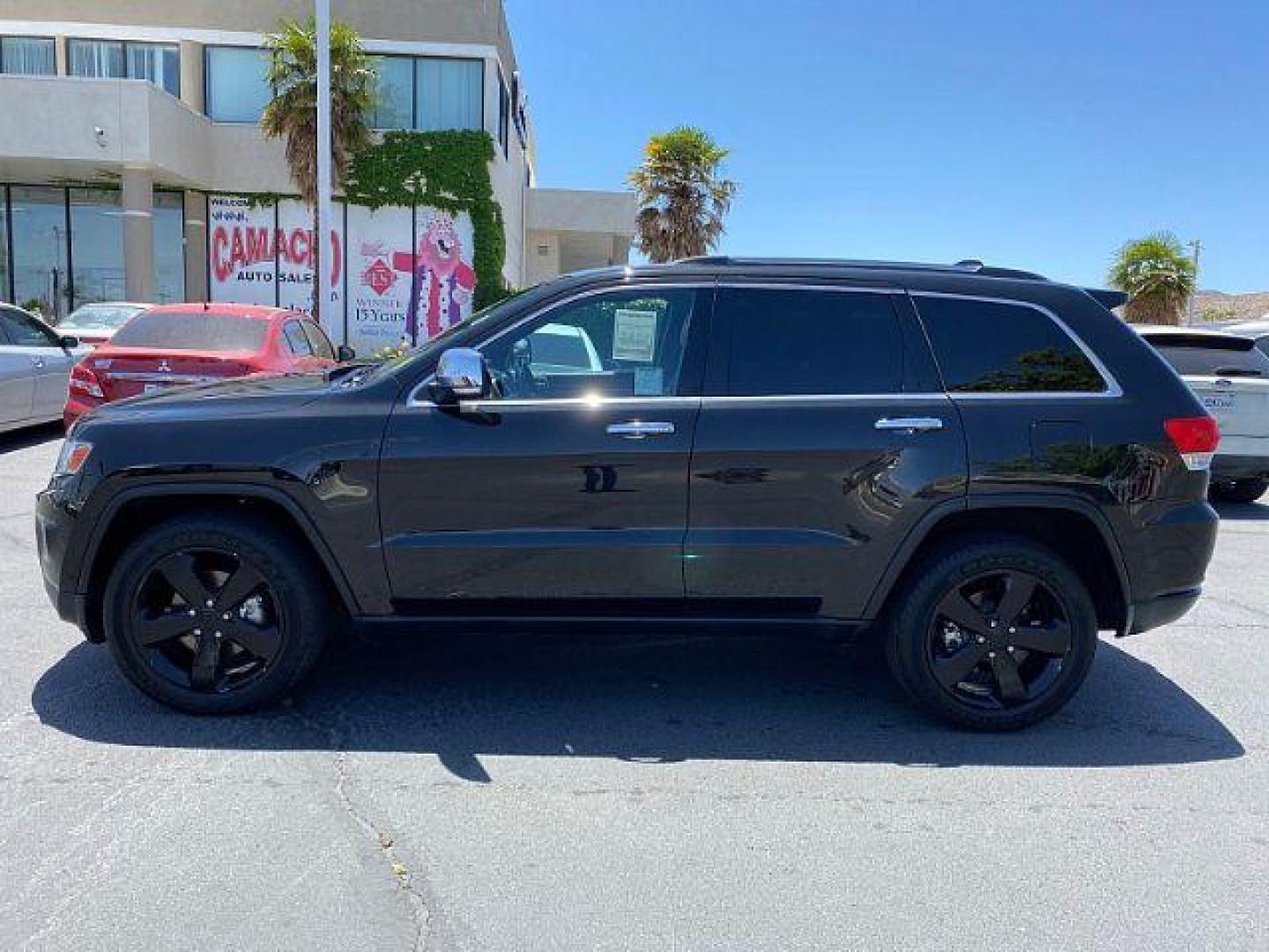 2014 Jeep Grand Cherokee (1C4RJEBM7EC) with an V6 EcoDiesel 3.0T engine, Automatic 8-Spd transmission, located at 412 Auto Vista Drive, Palmdale, 93551, (661) 945-0620, 34.592636, -118.136681 - Photo#3