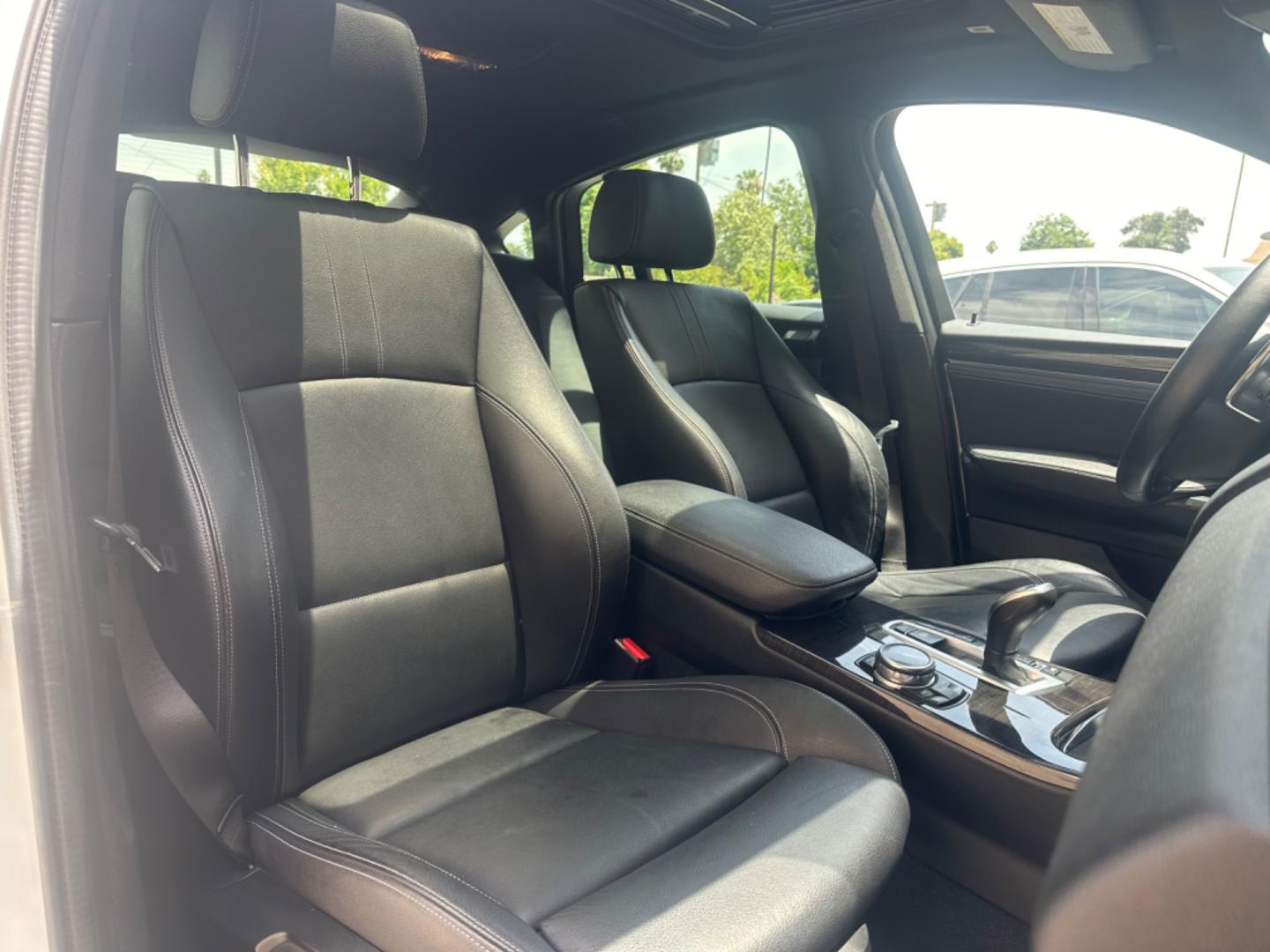 2015 Alpine White /Black BMW X4 Leather (5UXXW3C59F0) with an 2.0 engine, Automatic transmission, located at 30 S. Berkeley Avenue, Pasadena, CA, 91107, (626) 248-7567, 34.145447, -118.109398 - Discover the 2015 BMW X4 xDrive28i: Luxury Meets Affordability Are you in the market for a luxury vehicle that doesn't break the bank? Look no further than the 2015 BMW X4 xDrive28i. This impressive model offers the perfect blend of performance, style, and affordability. At our dealership, we under - Photo#26