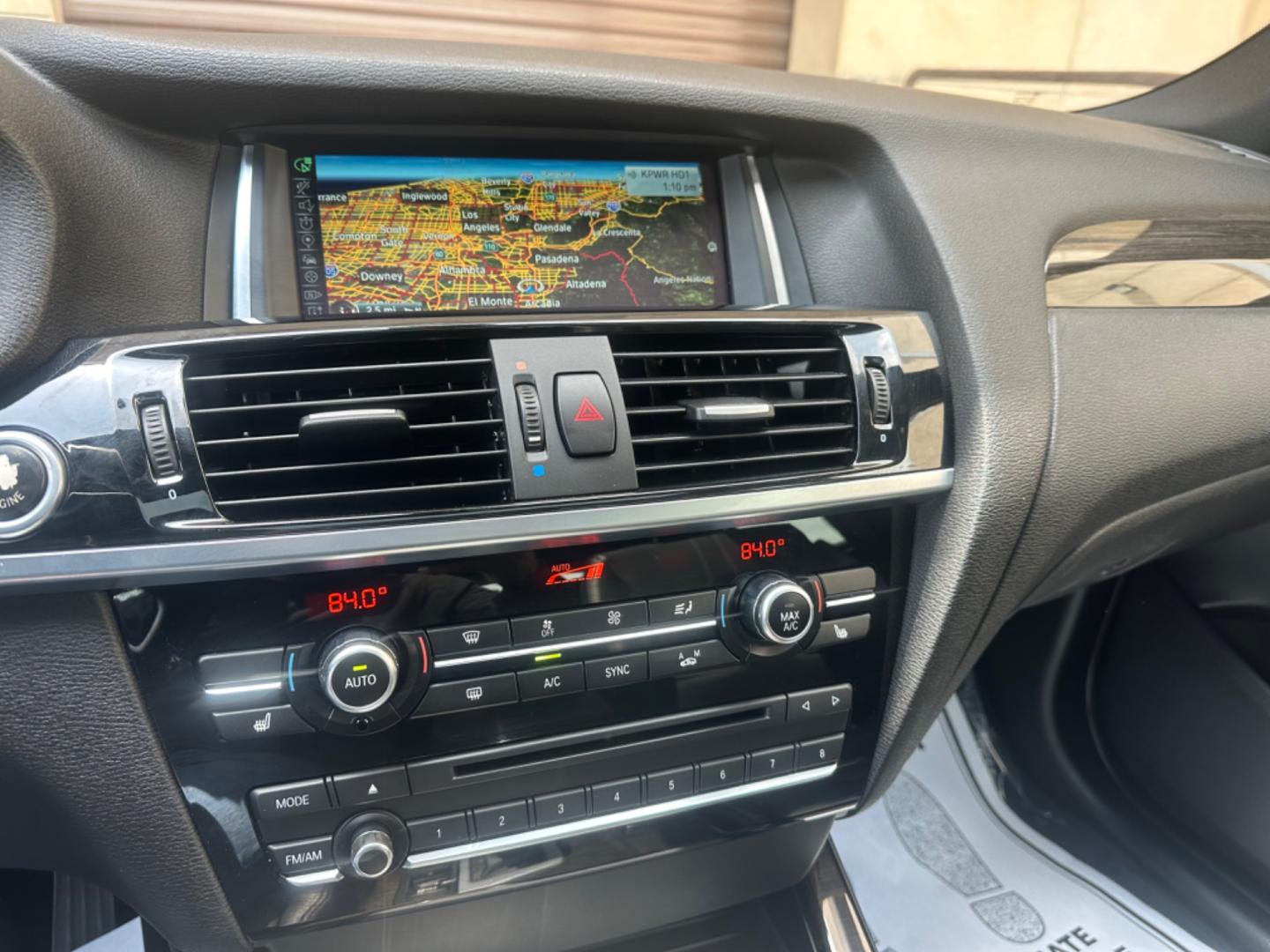 2015 Alpine White /Black BMW X4 Leather (5UXXW3C59F0) with an 2.0 engine, Automatic transmission, located at 30 S. Berkeley Avenue, Pasadena, CA, 91107, (626) 248-7567, 34.145447, -118.109398 - Discover the 2015 BMW X4 xDrive28i: Luxury Meets Affordability Are you in the market for a luxury vehicle that doesn't break the bank? Look no further than the 2015 BMW X4 xDrive28i. This impressive model offers the perfect blend of performance, style, and affordability. At our dealership, we under - Photo#29