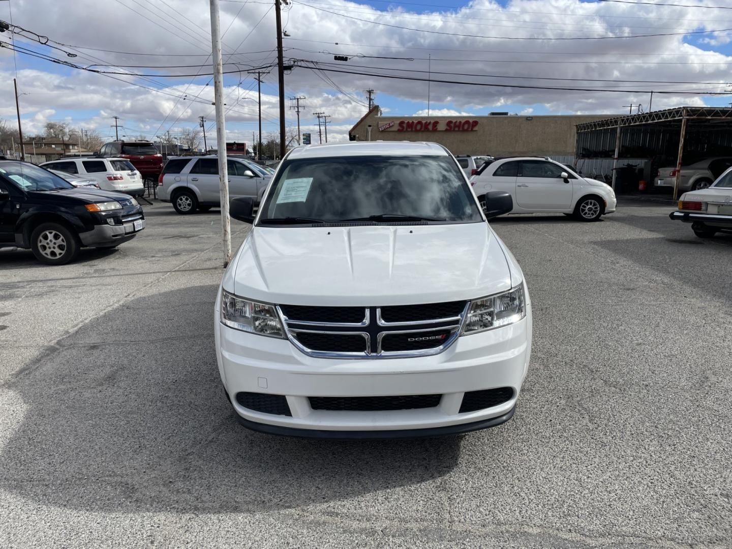 2015 Dodge Journey SE (3C4PDCABXFT) with an 2.4L L4 DOHC 16V engine, 4-Speed Automatic transmission, located at 44356 Date Ave., Lancaster, CA, 93534, (661) 945-6555, 34.688919, -118.139374 - Photo#0