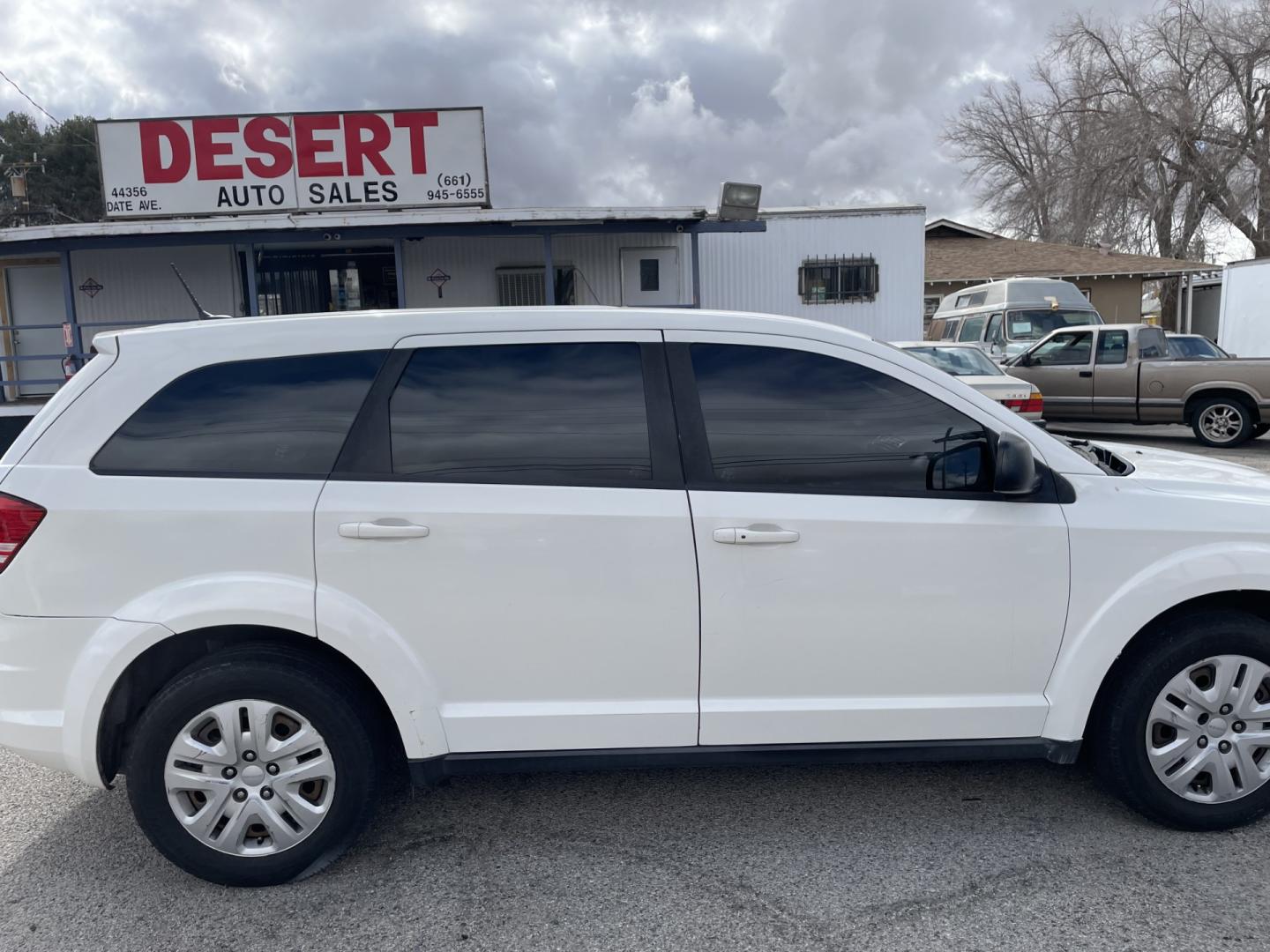 2015 Dodge Journey SE (3C4PDCABXFT) with an 2.4L L4 DOHC 16V engine, 4-Speed Automatic transmission, located at 44356 Date Ave., Lancaster, CA, 93534, (661) 945-6555, 34.688919, -118.139374 - Photo#1